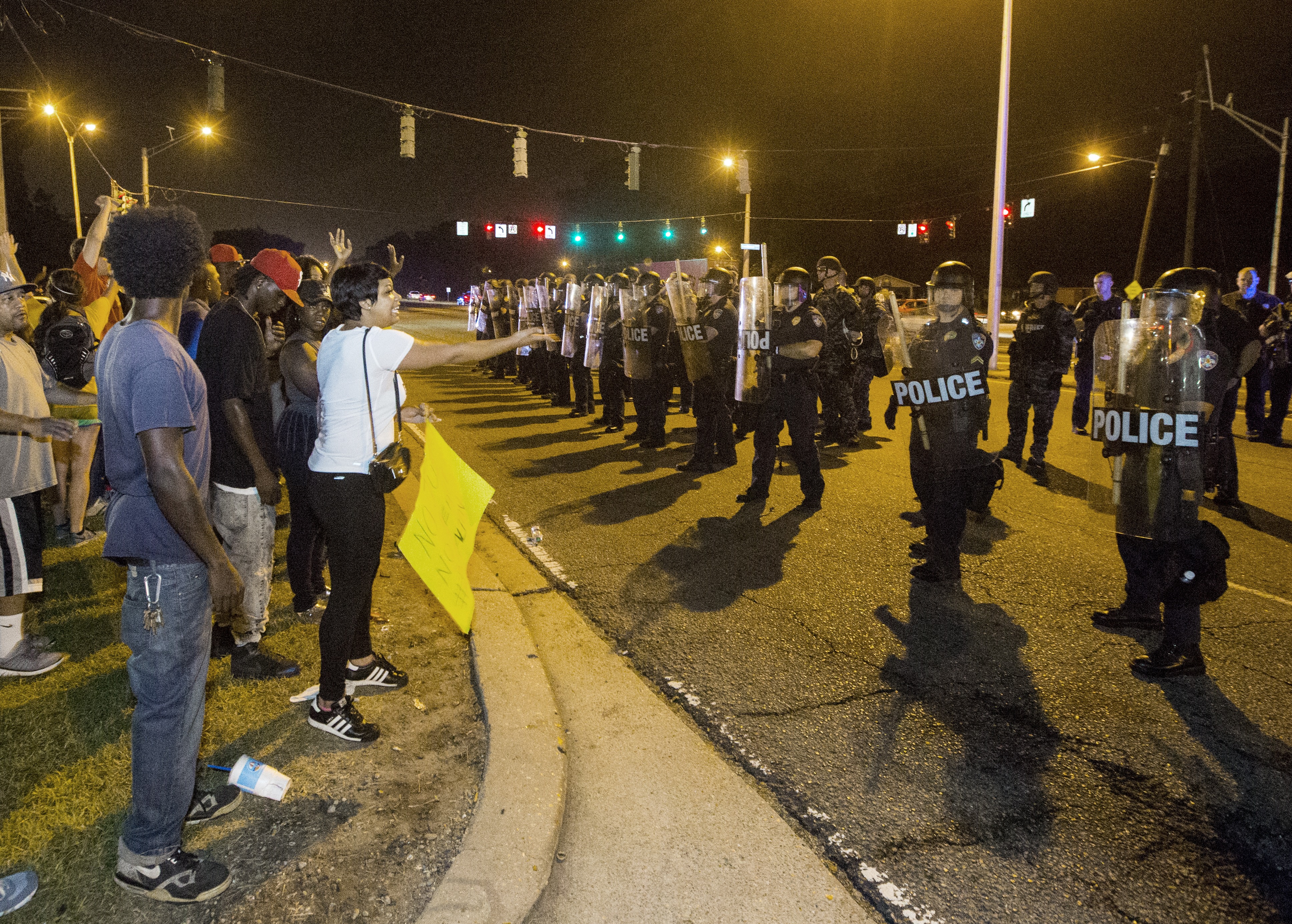 People gather to protest against the shooting of Alton Sterling on July 10, 2016 in Baton Rouge, Louisiana. (Mark Wallheiser—Getty Images)