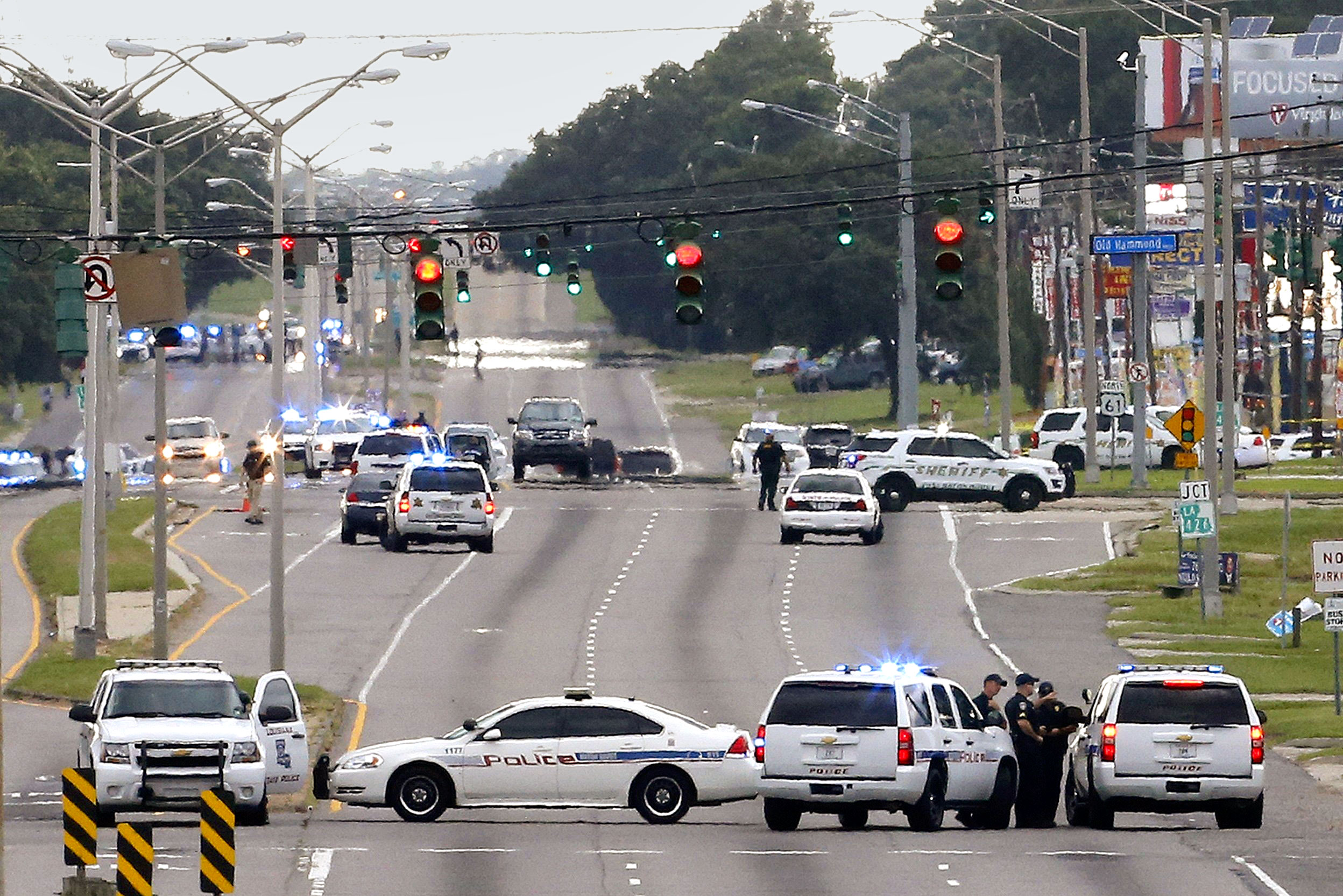 On July 17, police responded to the fatal shooting of three officers in Baton Rouge (JONATHAN BACHMAN—REUTERS)