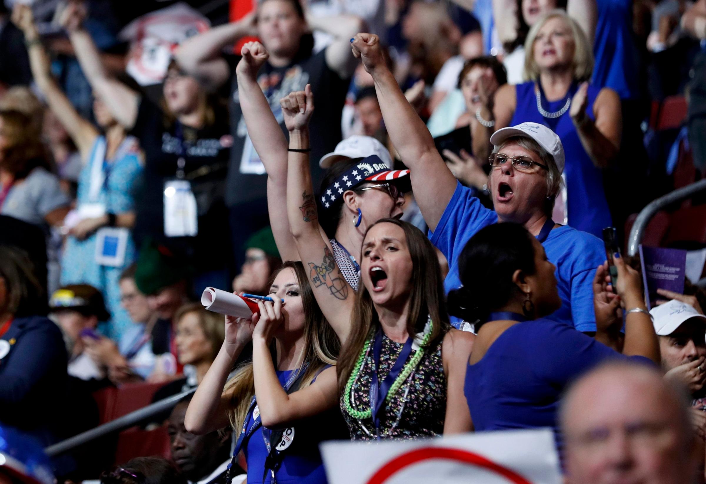 Supporters of Vermont Sen. Bernie Sanders chant his name as they protest on the floor during the first day of the Democratic National Convention in Philadelphia, on July 25, 2016.