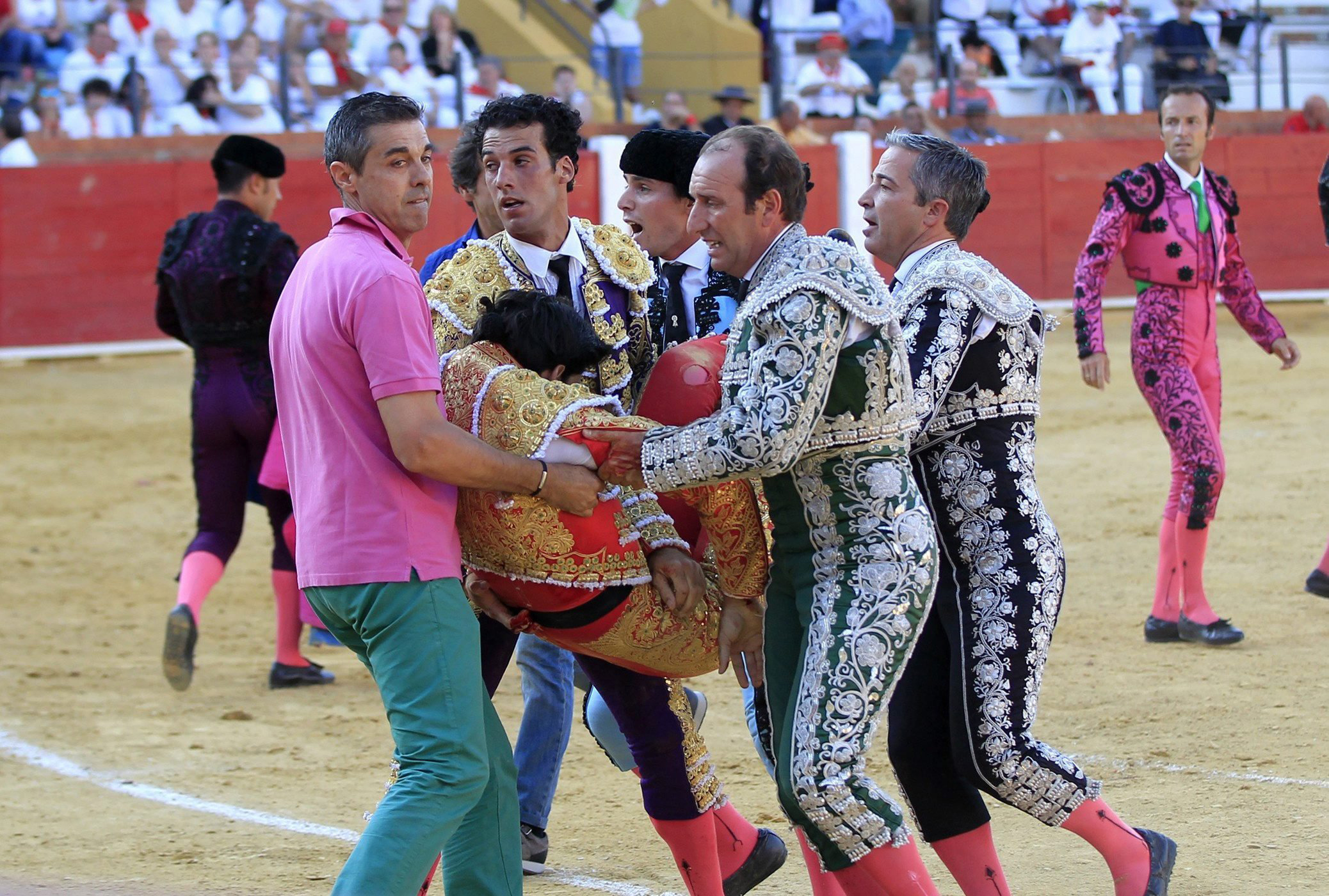 Spanish bullfighter Victor Barrio, 29, is carried out from the bullring after being gored during a bullfight held on the occasion of Feria del Angel in Teruel, Aragon, July 9, 2016. (Antonio Garcia—EPA)