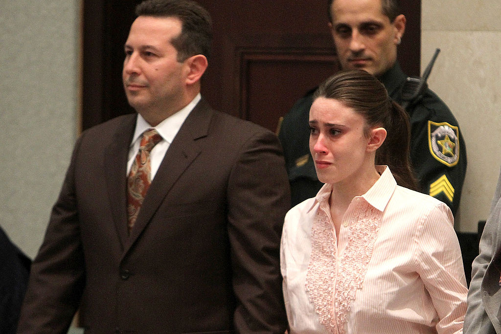 Casey Anthony (R) reacts to being found not guilty on murder charges at the Orange County Courthouse on July 5, 2011 in Orlando, Florida. (Pool&mdash;Getty Images)