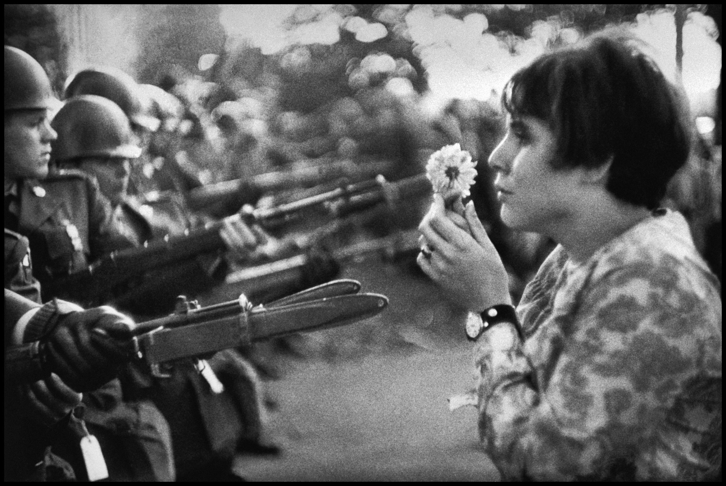 Jan Rose Kasmir, confronts the American National Guard outside the Pentagon during the 1967 anti-Vietnam march. This march helped to turn public opinion against the US war in Vietnam.