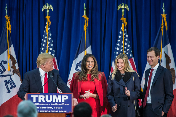 Republican presidential candidate Donald Trump (L) is joined on stage by his wife Melania Trump, daughter Ivanka Trump, and son-in-law Jared Kushner (L-R) at a campaign rally at the Ramada Waterloo Hotel and Convention Center on February 1, 2016 in Waterloo, Iowa.