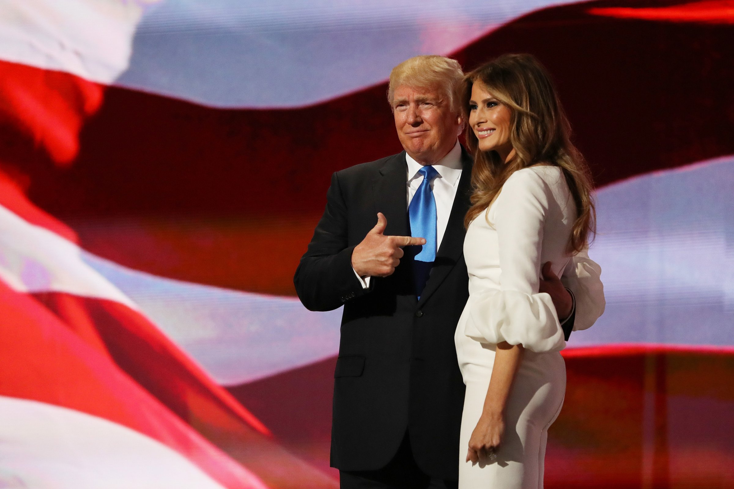 Republican presidential nominee Donald Trump gestures to his wife Melania after she delivered a speech on the first day of the Republican National Convention at the Quicken Loans Arena in Cleveland on July 18, 2016.
