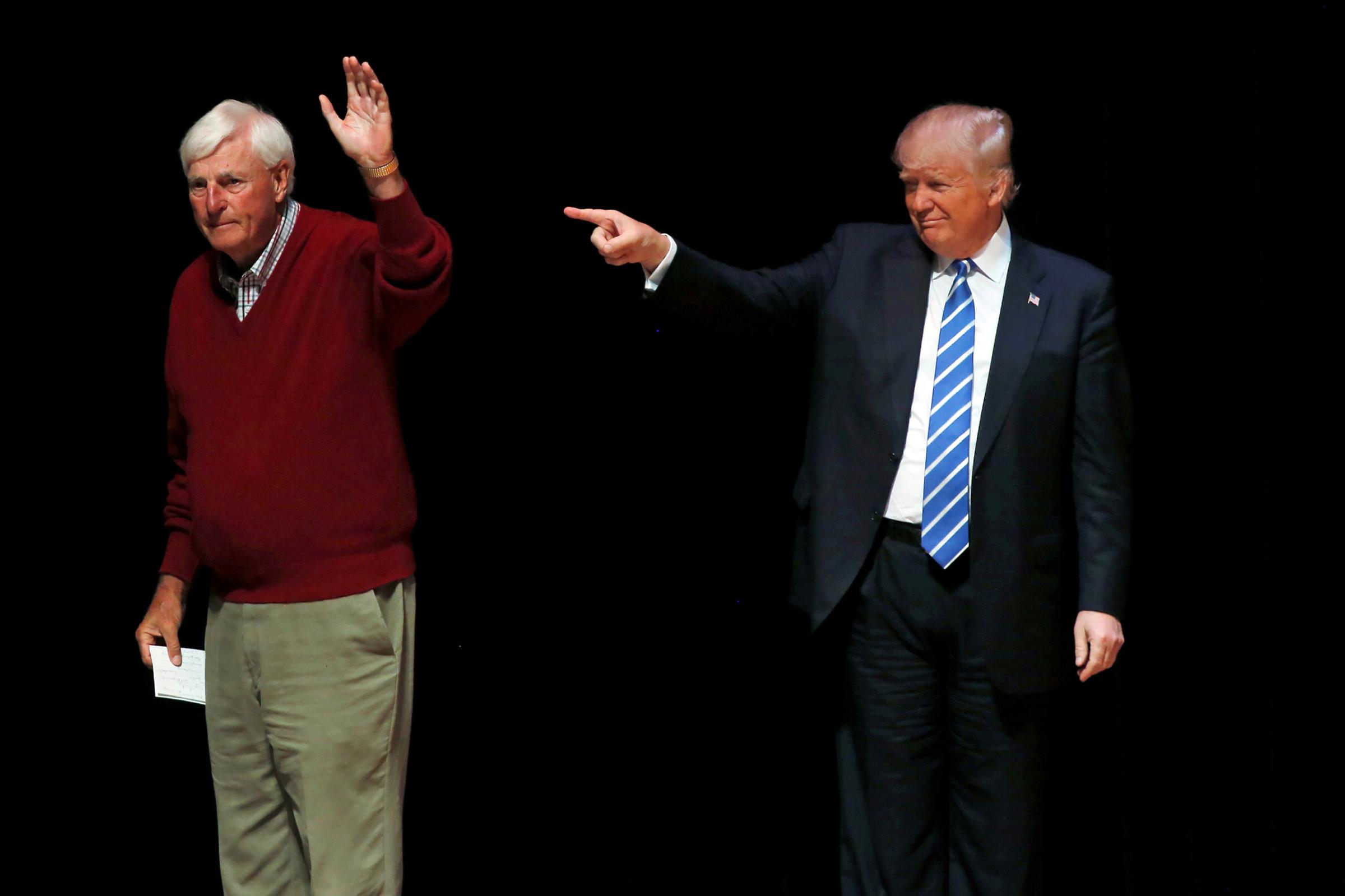 Republican presidential candidate Donald Trump is joined on stage by former Indiana University basketball coach Bob Knight at a campaign event at the Old National Events Plaza in Evansville, Ind. on April 28, 2016.