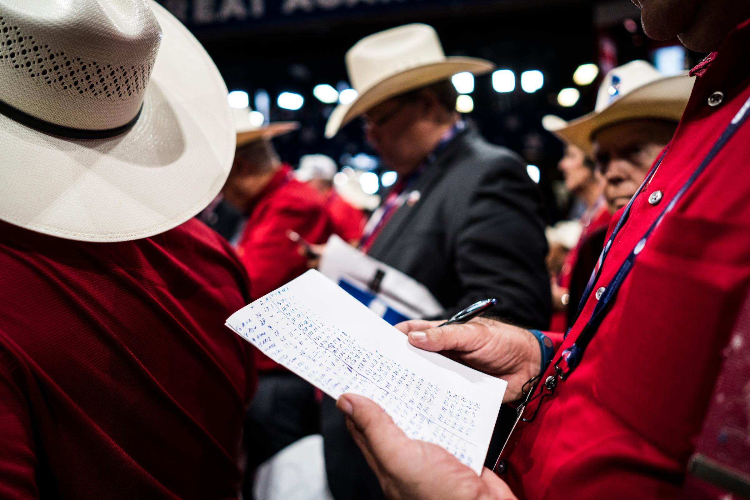 A Texas delegate tallies up the votes for the Donald Trump's nomination at the Republican National Convention in Cleveland on Tuesday, July 19, 2016.