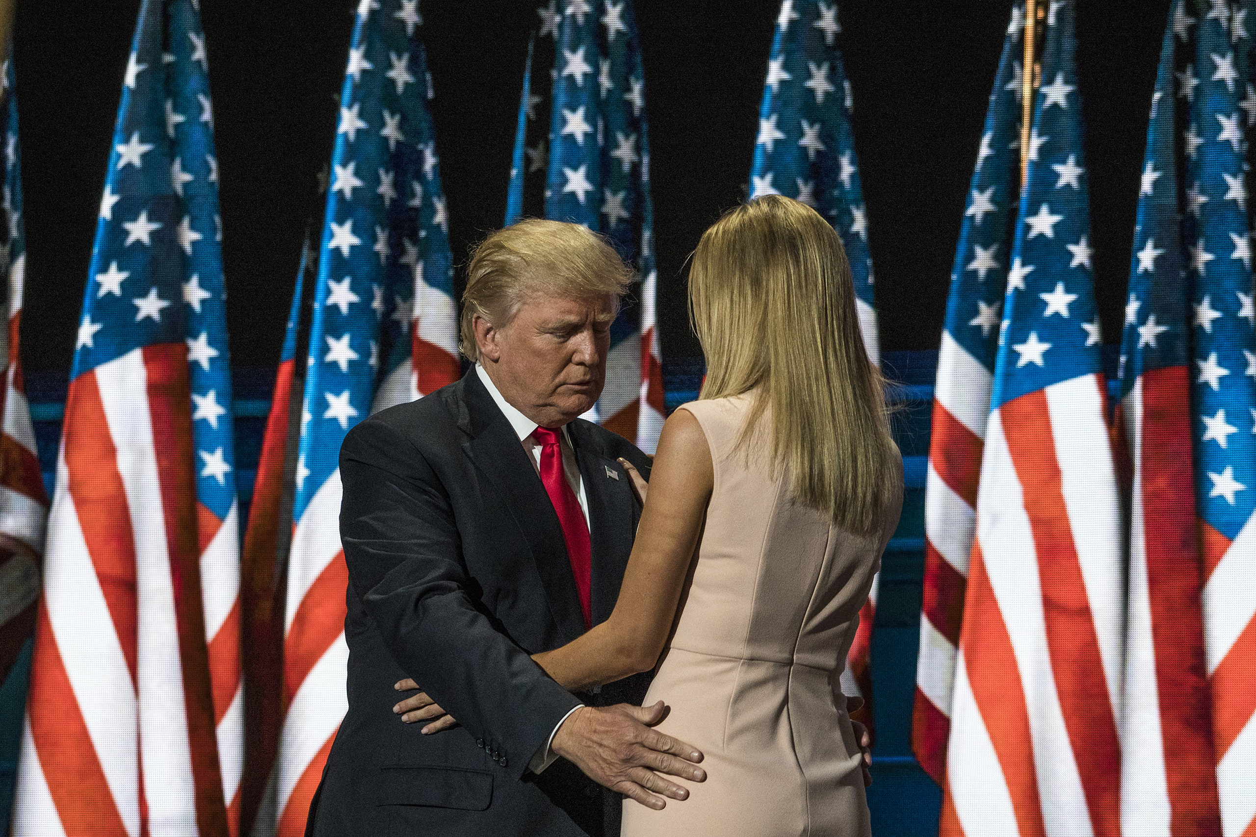 Republican presidential candidate Donald Trump walks on stage after his daughter, Ivanka Trump, introduced him on the fourth day of the Republican National Convention on July 21, 2016 at the Quicken Loans Arena in Cleveland, Ohio.