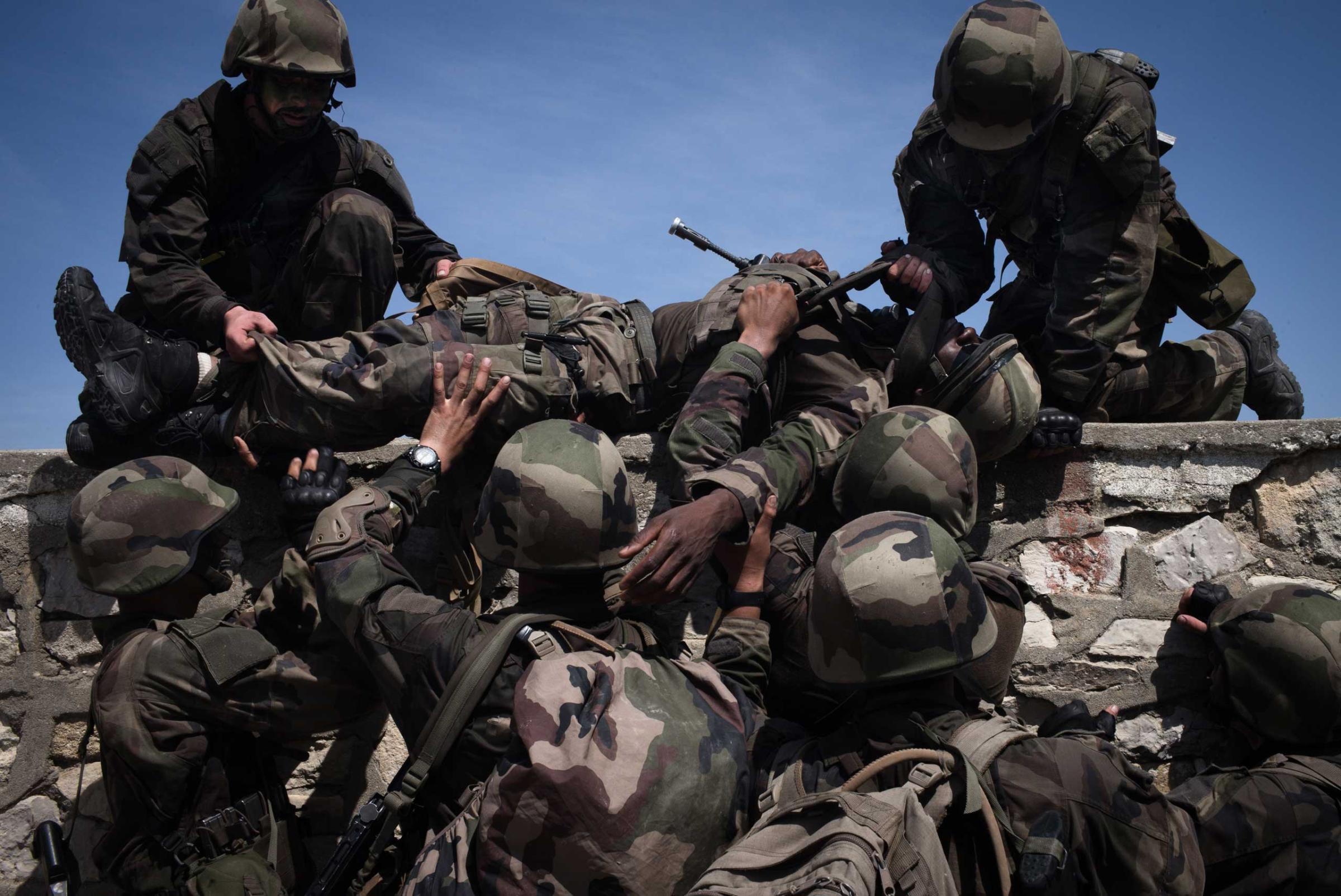 Body extraction training exercise in the French Foreign Legion camp near Nimes, France. Aug. 7, 2015.