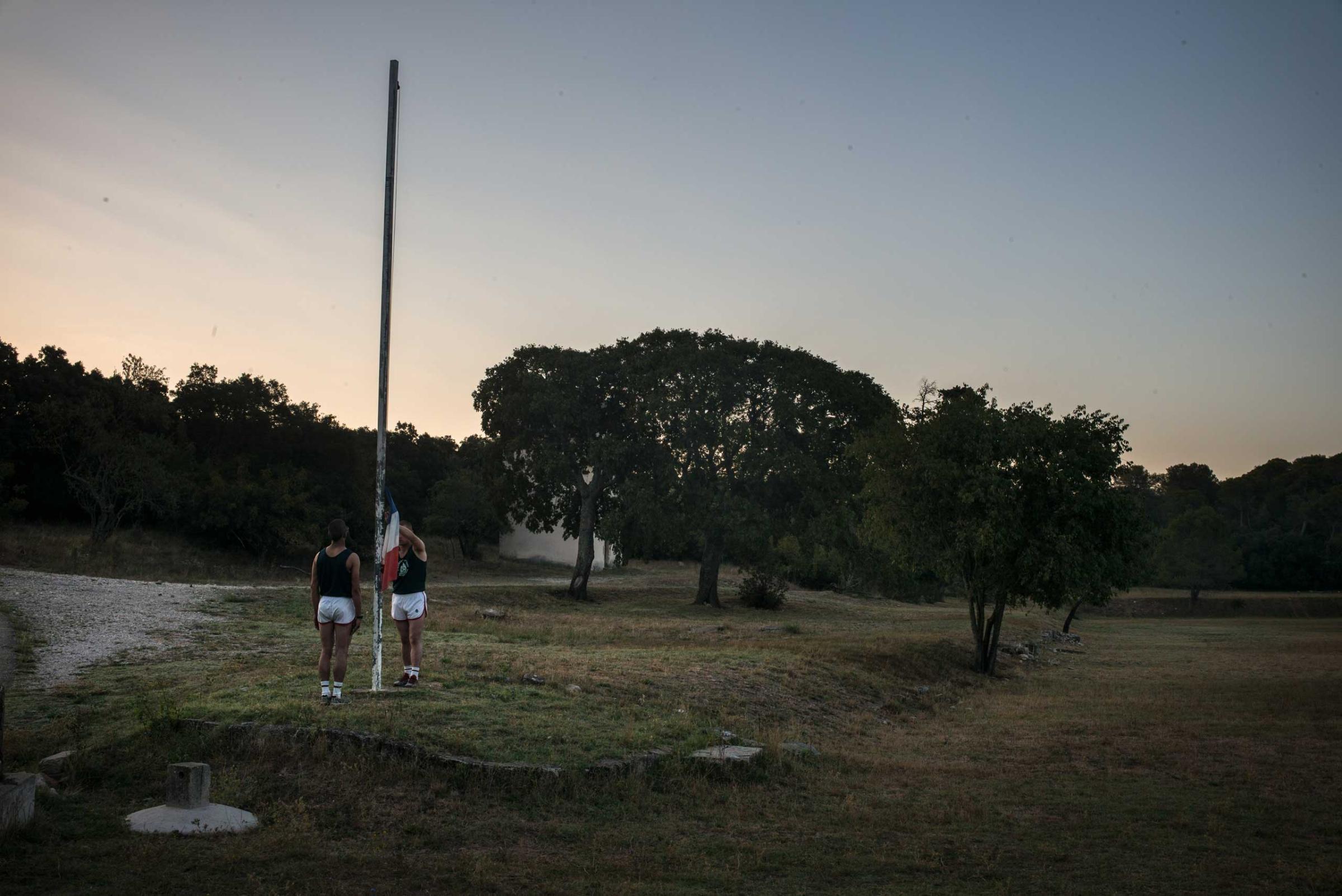 Members of the French Foreign Legion Legionnaires prepare for the morning " flag" ceremony. Aug. 6, 2015.