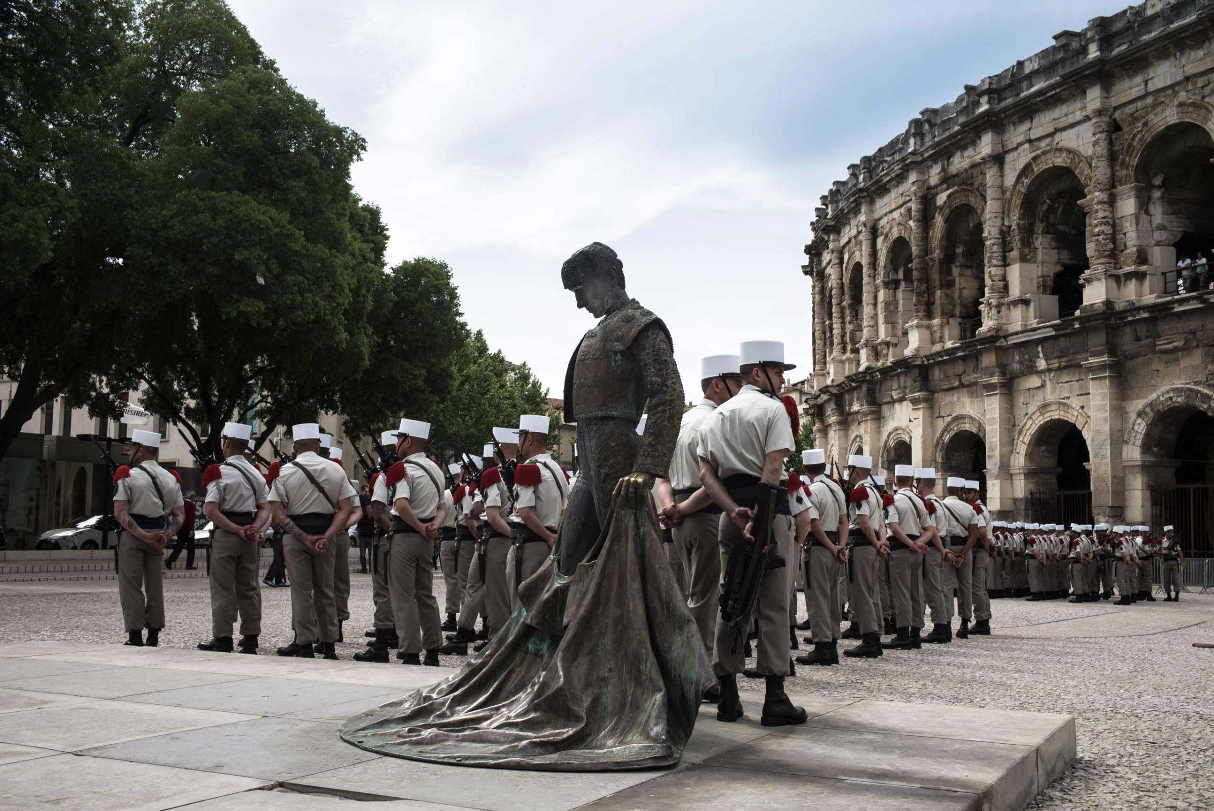 Members of the French Foreign Legion get ready for their annual parade on "Camerone Day" at Nimes' Roman Arenas in France. April 29, 2015.