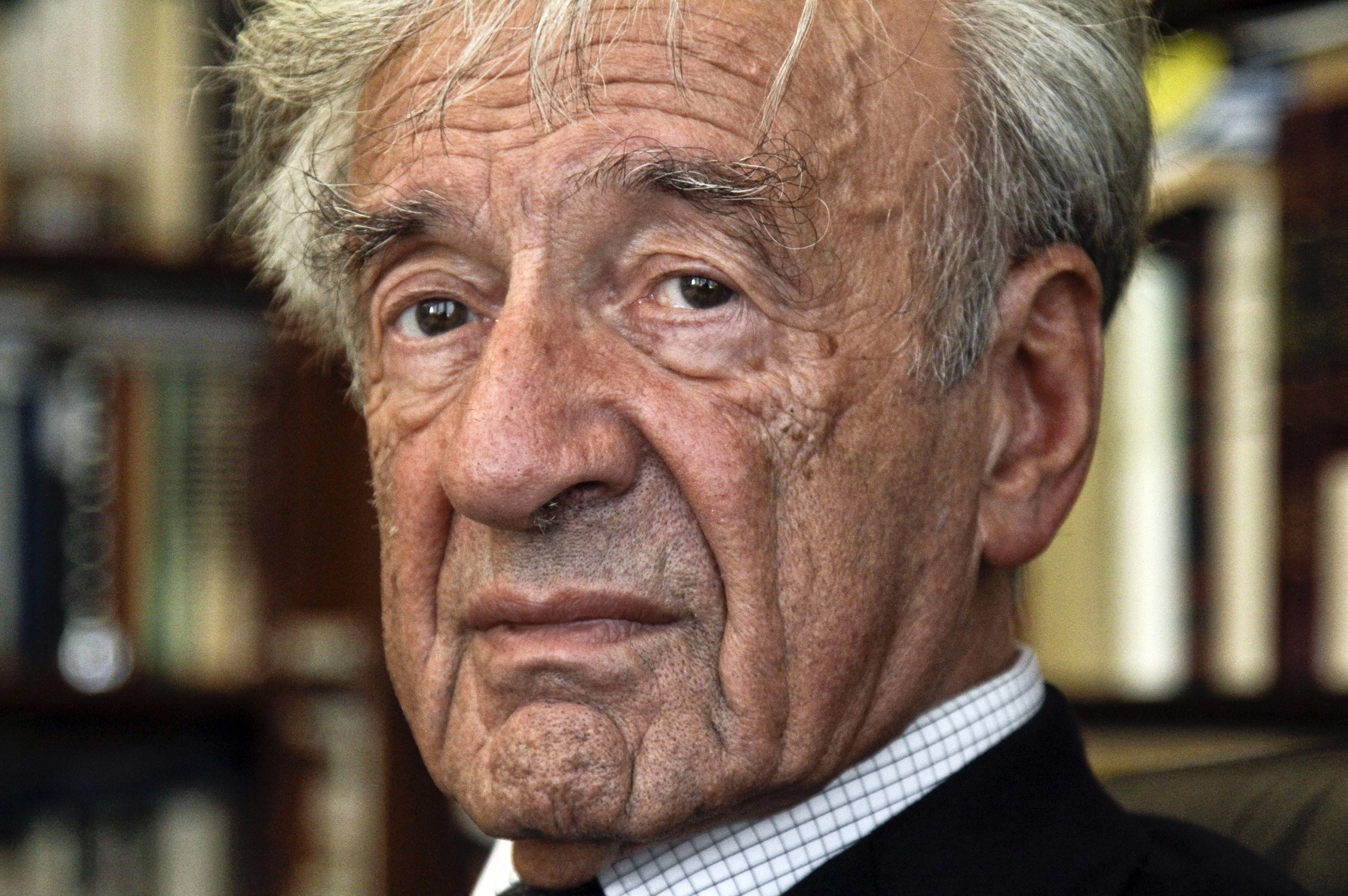 This Sept. 12, 2012, photo shows Holocaust activist and Nobel Peace Prize recipient Elie Wiesel, 83, in his office in New York. (Bebeto Matthews—AP)