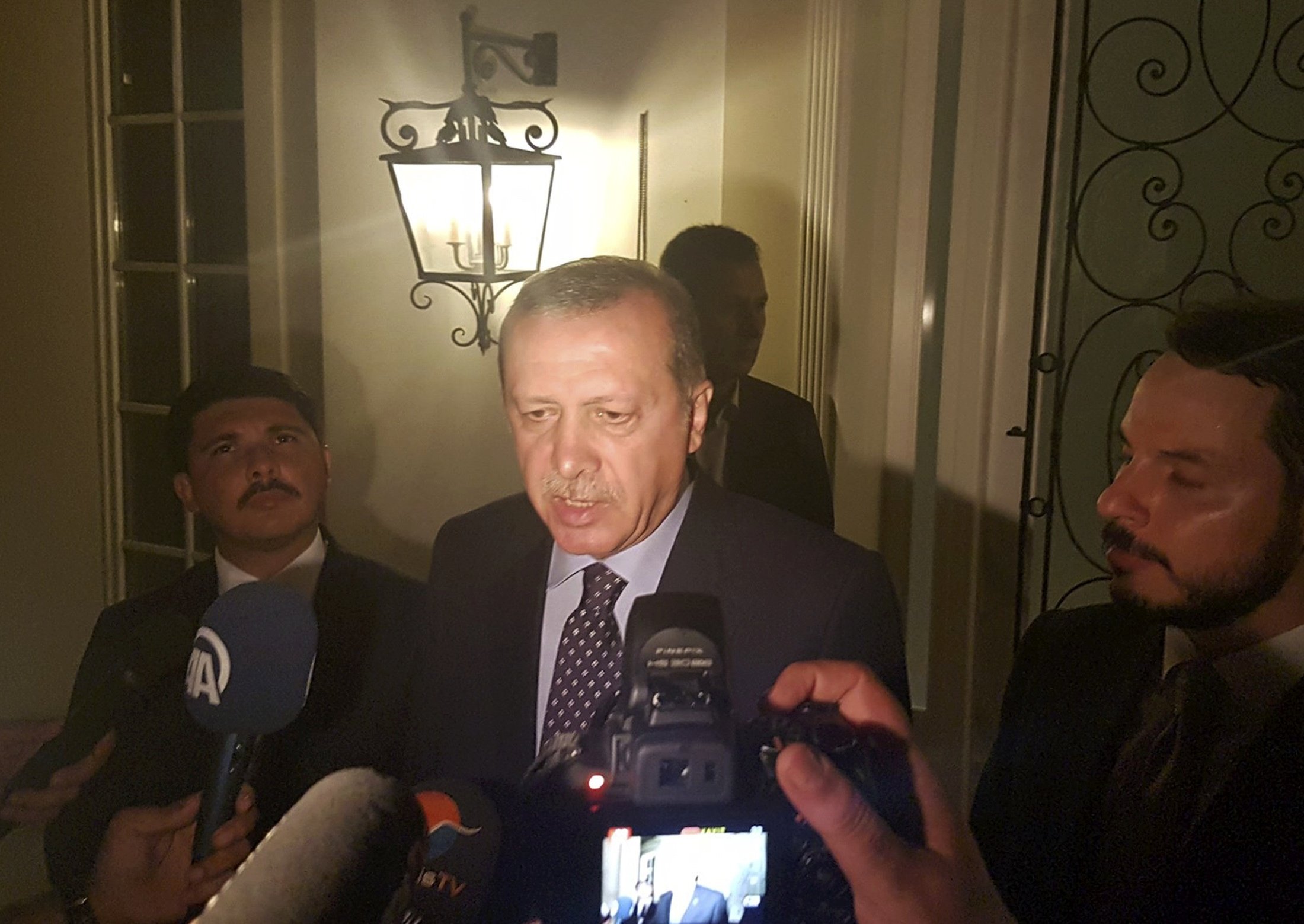 Turkish President Recep Tayyip Erdogan speaks to media in the resort town of Marmaris, Turkey, on July 15, 2016.