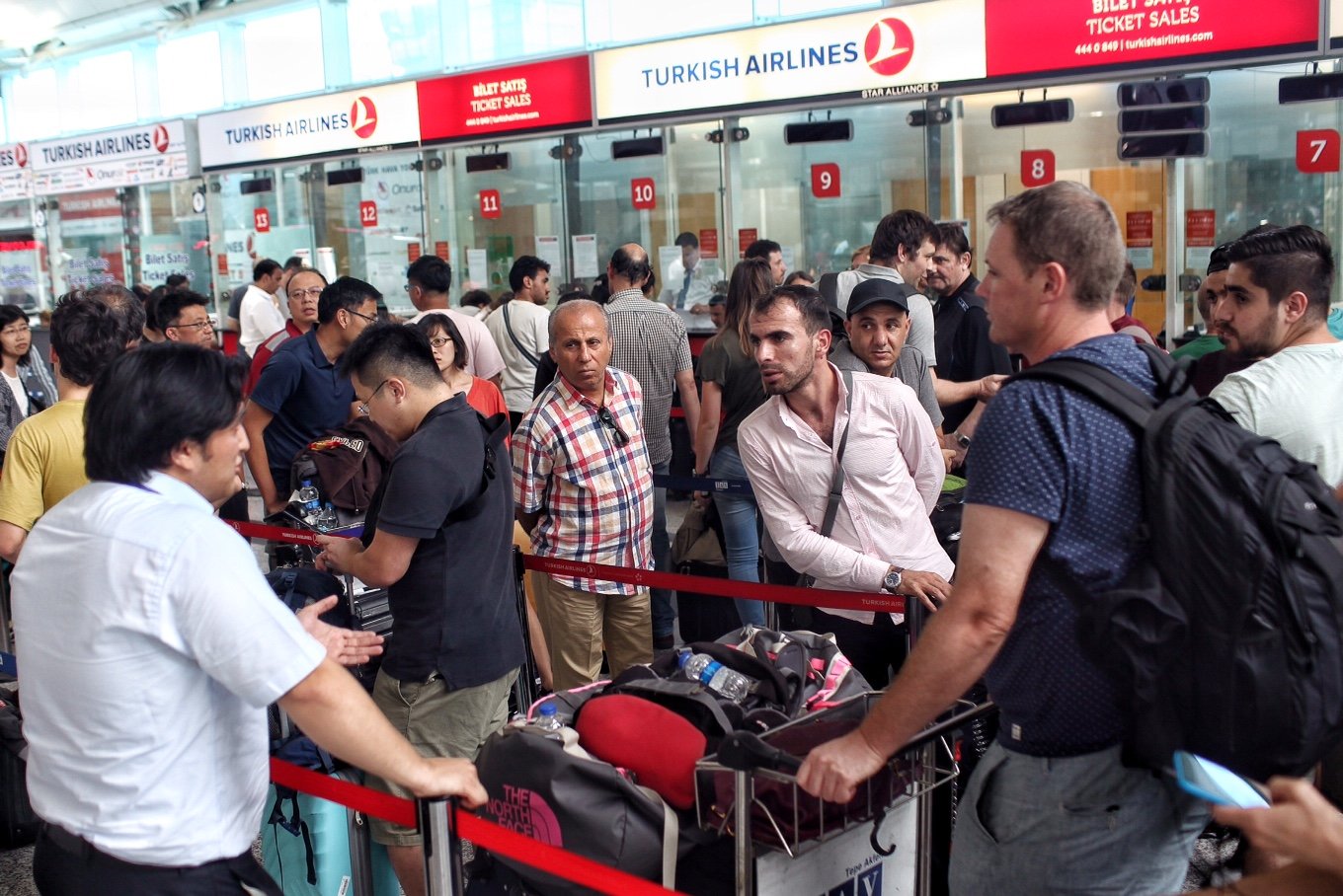 International passengers wait for flight information after flights to Ataturk Airport were delayed or cancelled on July 17, 2016 in Istanbul. (Kursat Bayhan—Getty Images)