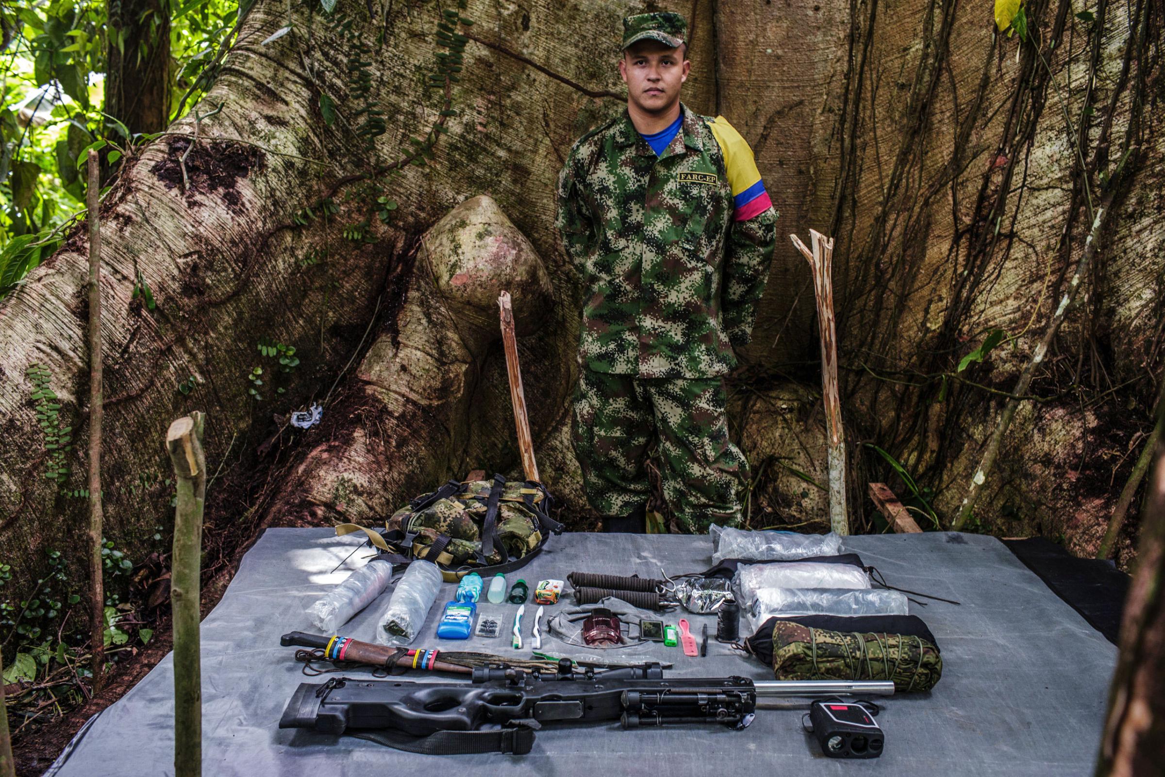 "Junior " is a 20-year old, who has been with FARC for seven years. He has attended several training courses to learn sniper fire and accuracy for special weapons. He uses tactical binoculars to calculate the distance between the target and the shooter. In order to move through the jungle swiftly, his luggage is lightweight.