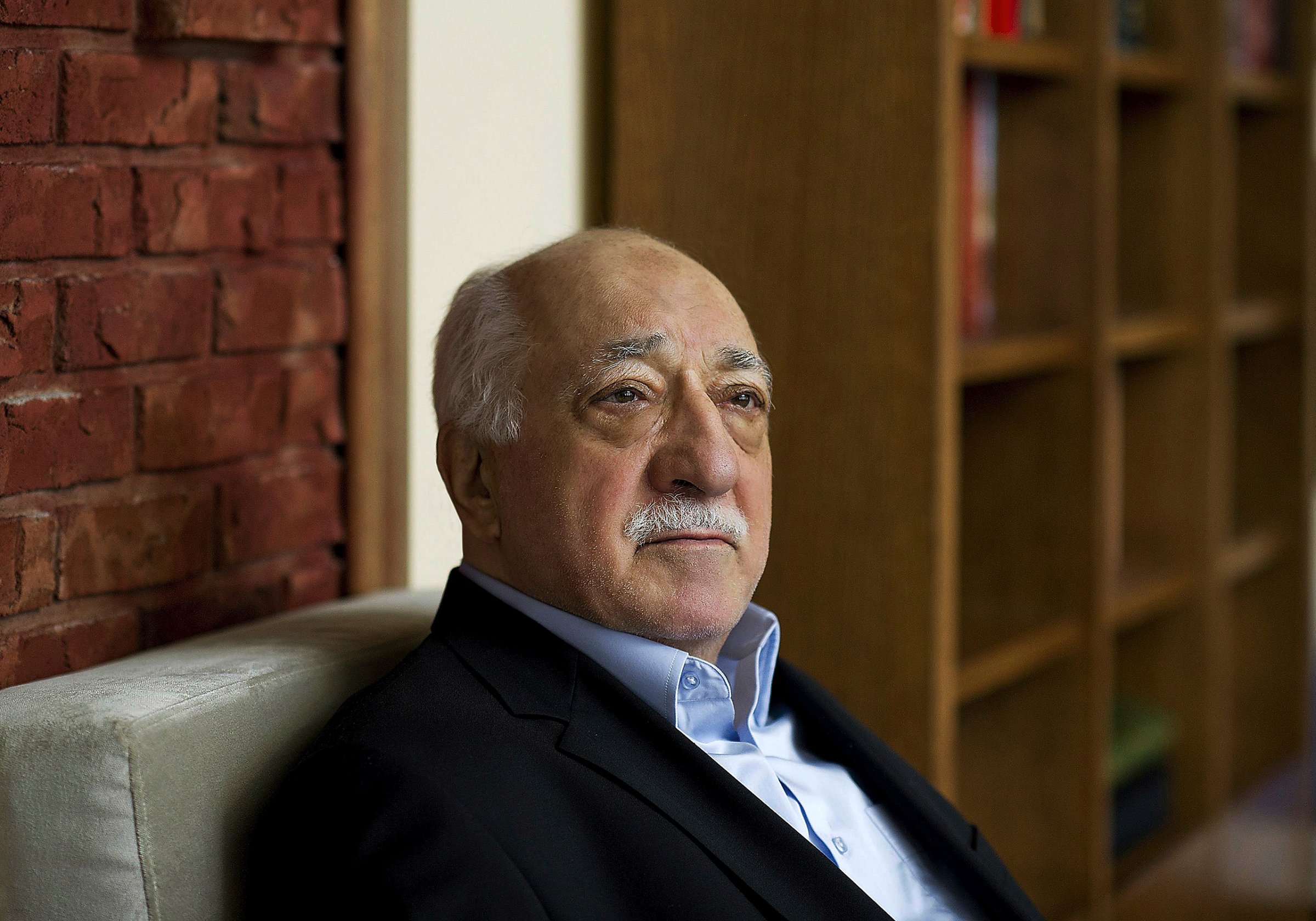 In this March 15, 2014, file photo, Turkish Islamic preacher Fethullah Gulen sits in his residence in Saylorsburg, Pa.