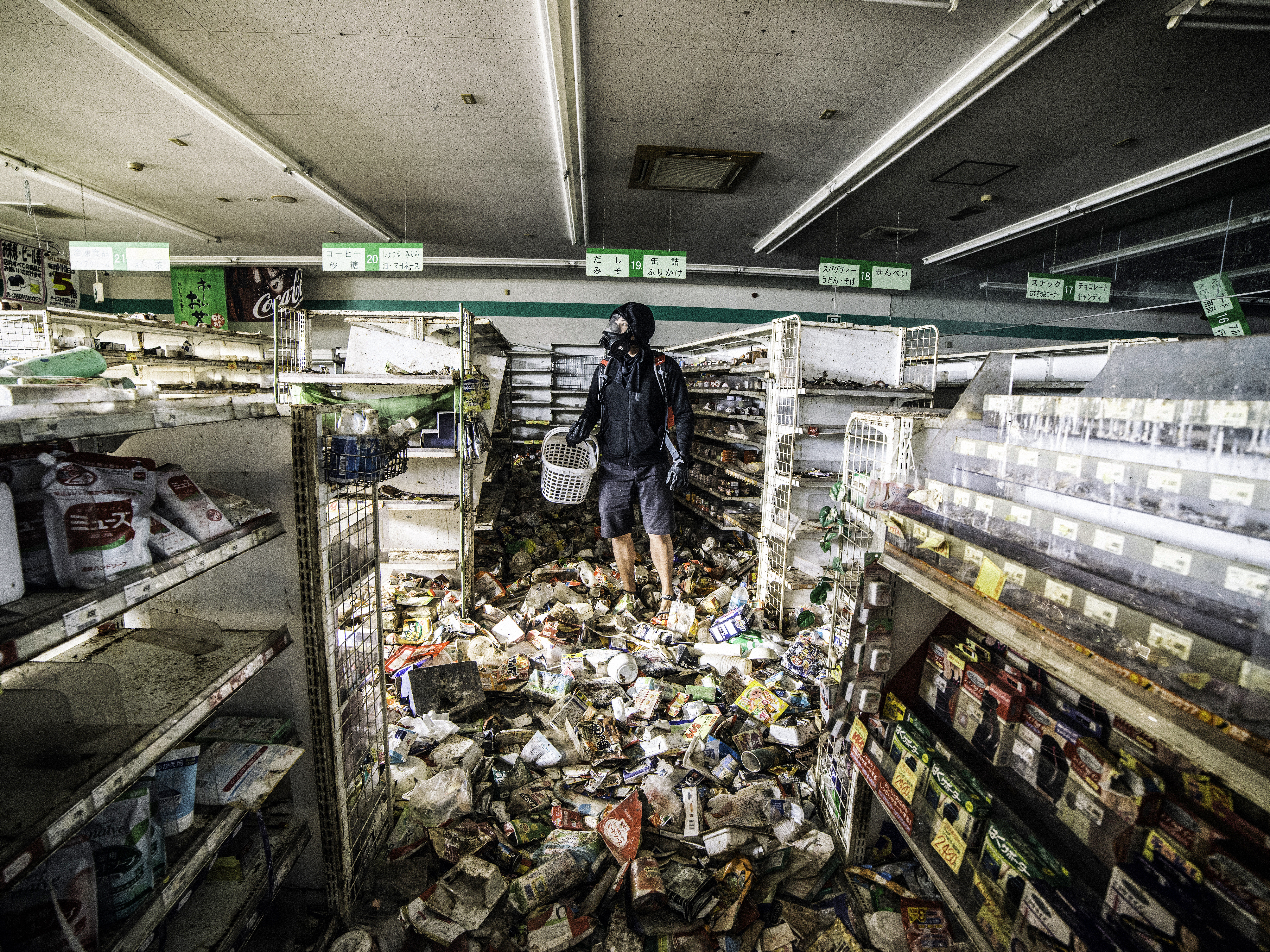 Malaysian photographer Keow Wee Loong ventured — ghostlike, if you will — into the Fukushima Exclusion Zone, within the twelve-mile radius around the old power plant, in June. The photographer  shops  in the super market  York Benimaru on June 4, 2016.