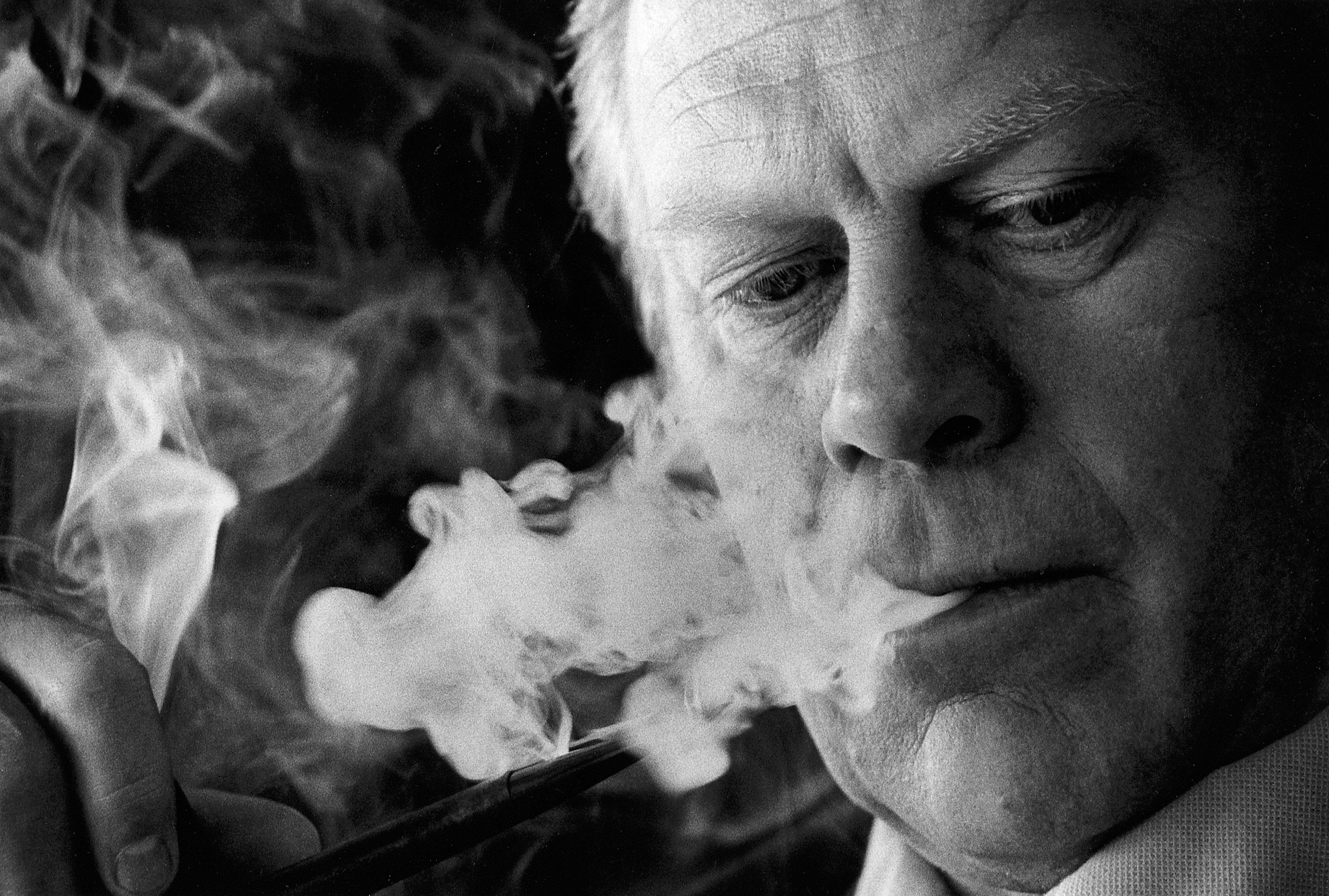 Portrait of President Gerald Ford smoking.
