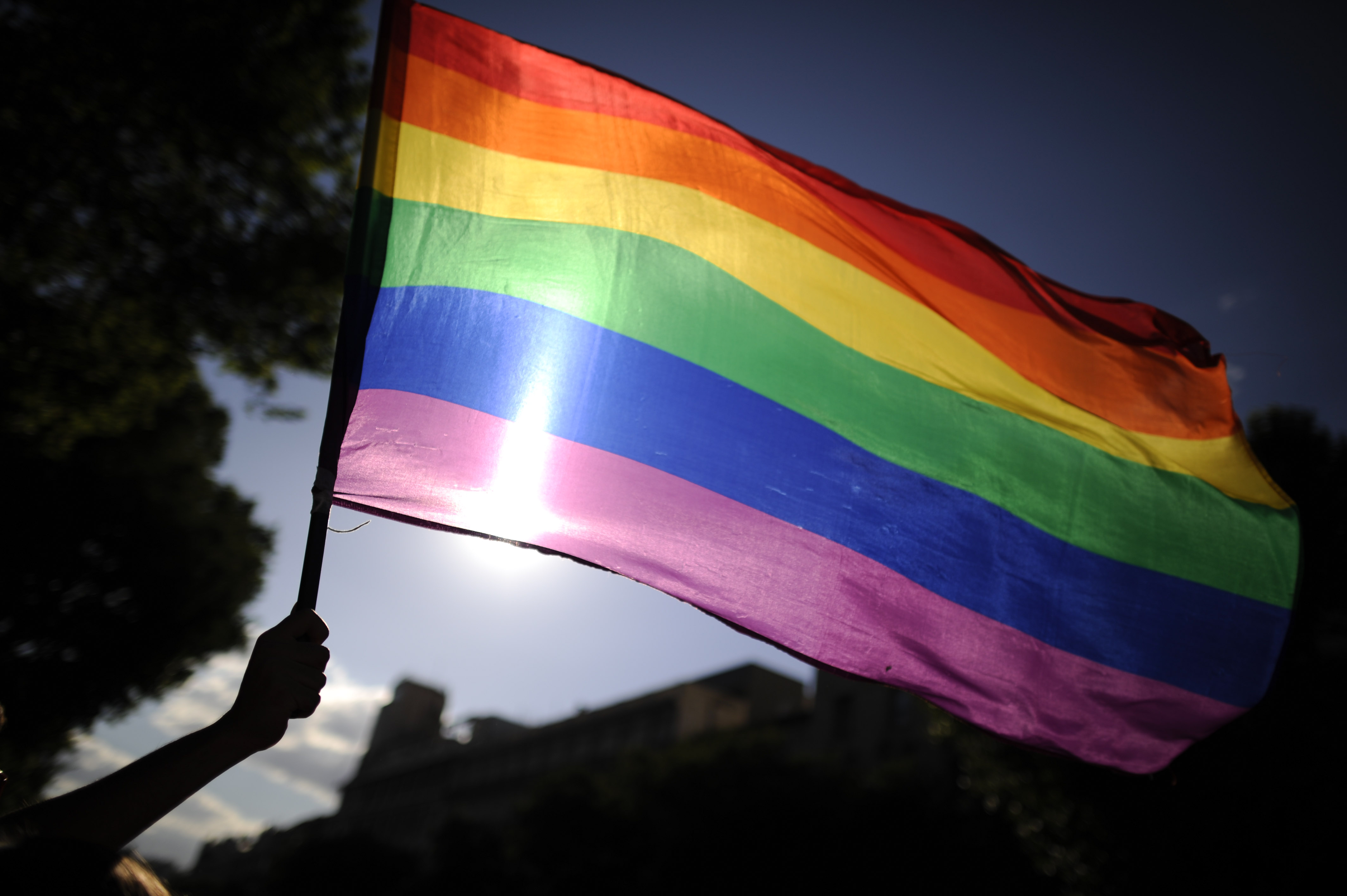 A participants holds a rainbow flag during the gay and lesbian pride parade in the center of Madrid on June 30, 2012 (Pedro Armestre—AFP/Getty Images)