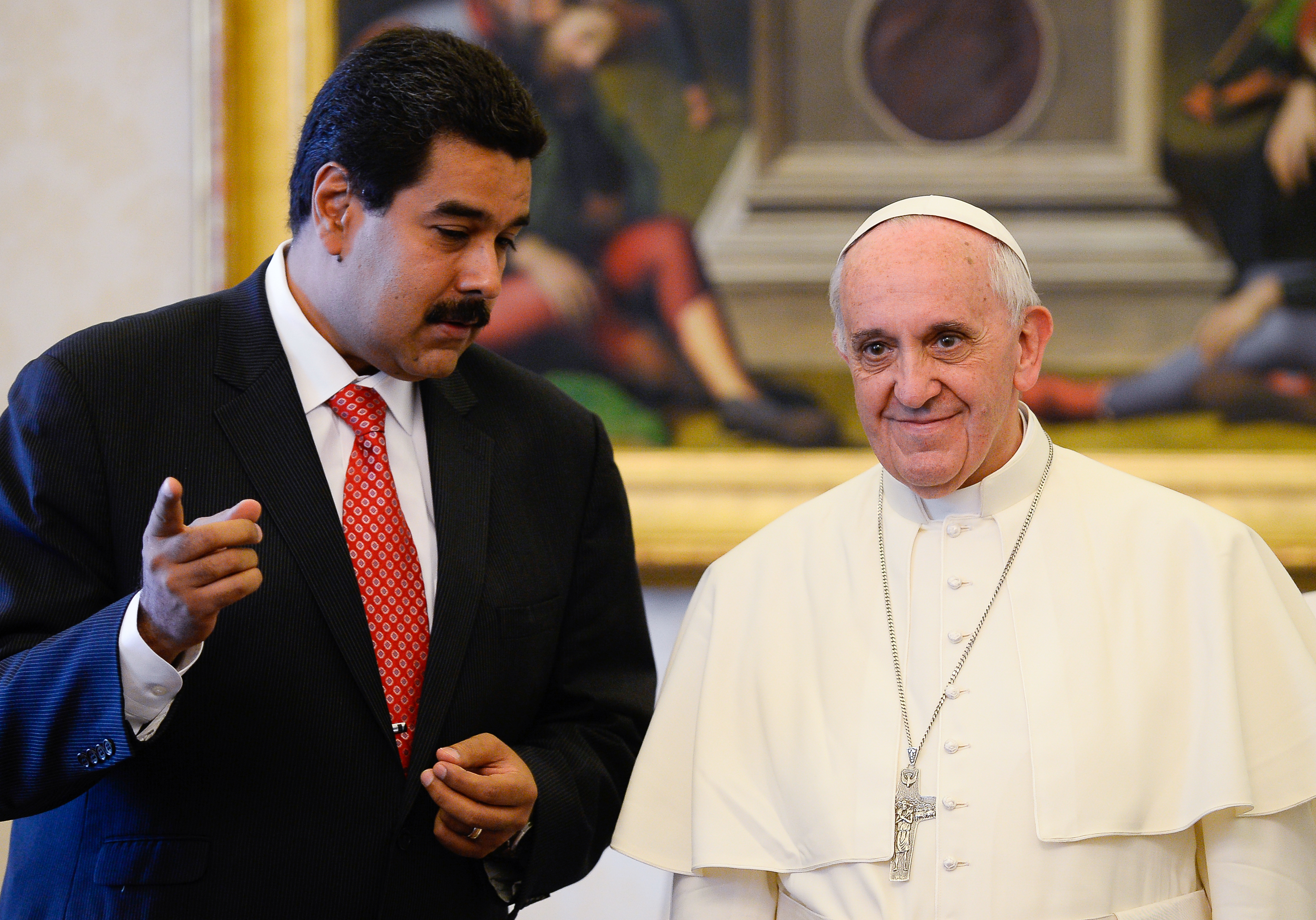 Pope Francis speaks with Venezuelan President Nicol&aacute;s Maduro during a private audience in the pontiff's library on June 17, 2013 at the Vatican. (Andreas Solaro—AFP/Getty Images)