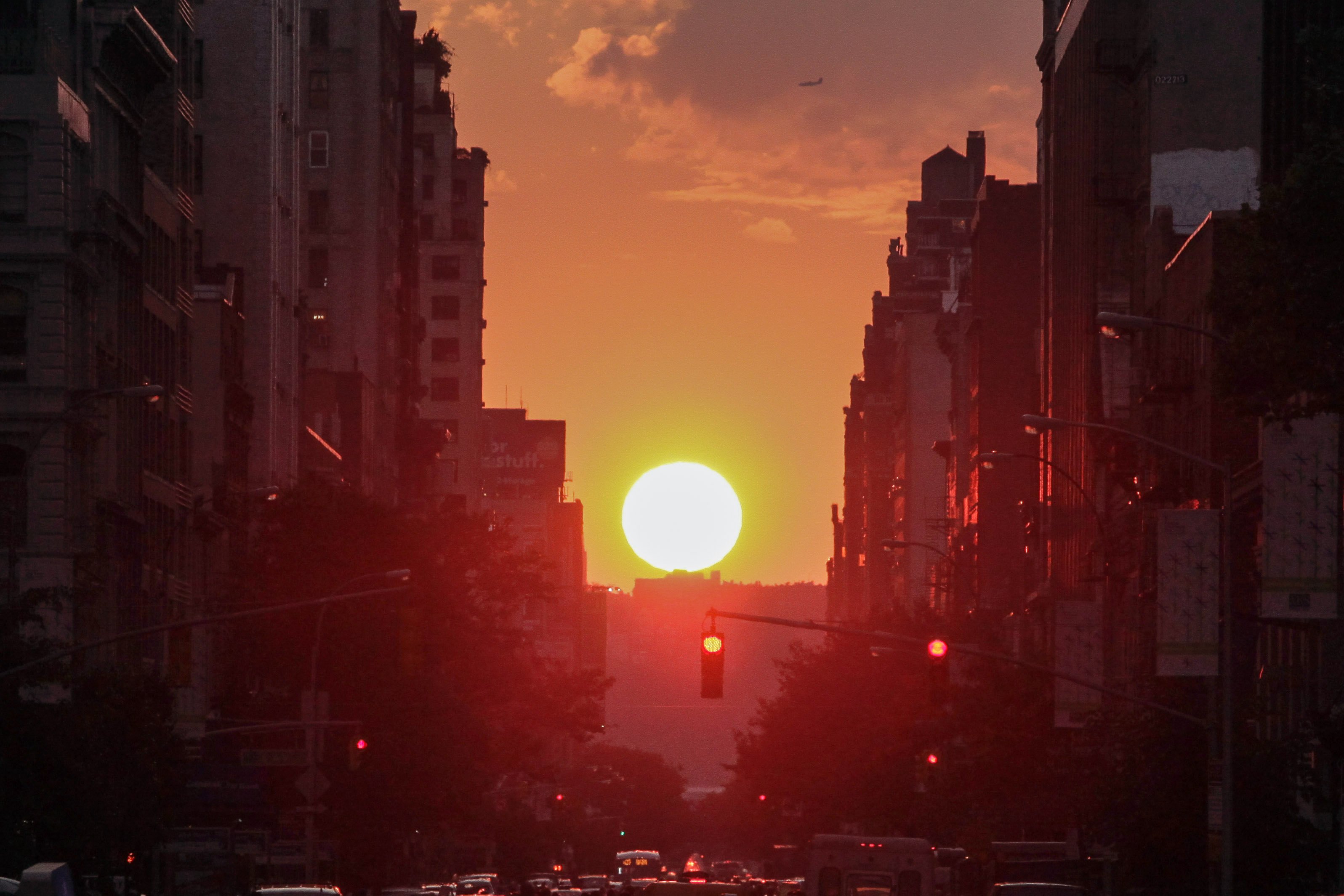The sun sets on 23rd Street during "Manhattanhenge" on July 11, 2014 in New York City. (Kena Betancur—Getty Images)
