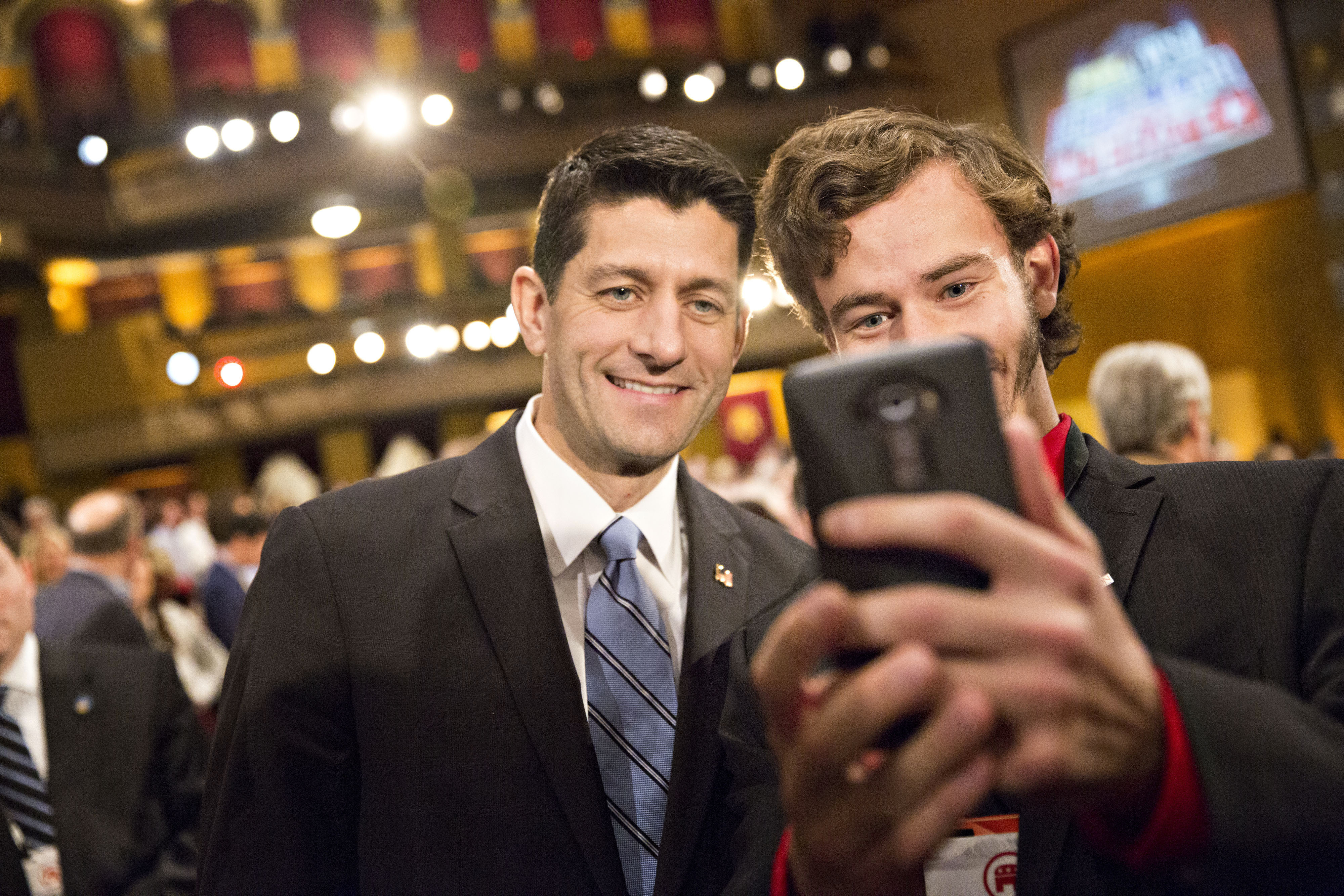 U.S. House Speaker Paul Ryan taking a similarly diverse selfie during a presidential candidate debate in Milwaukee, Wisconsin, on Nov. 10, 2015. (Bloomberg/Getty Images)