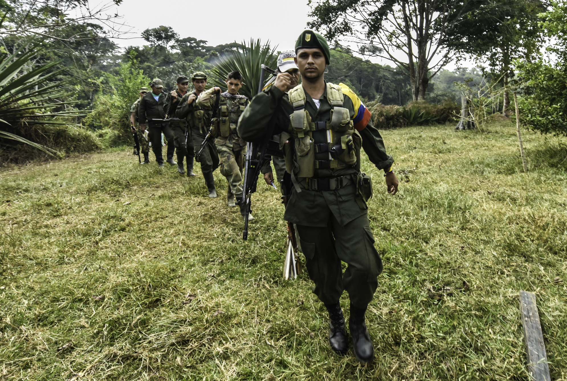 Revolutionary Armed Forces of Colombia (FARC) members patrol a camp in the Magdalena Medio region, Antioquia department, Colombia on February 18, 2016. (LUIS ACOSTA—AFP/Getty Images)