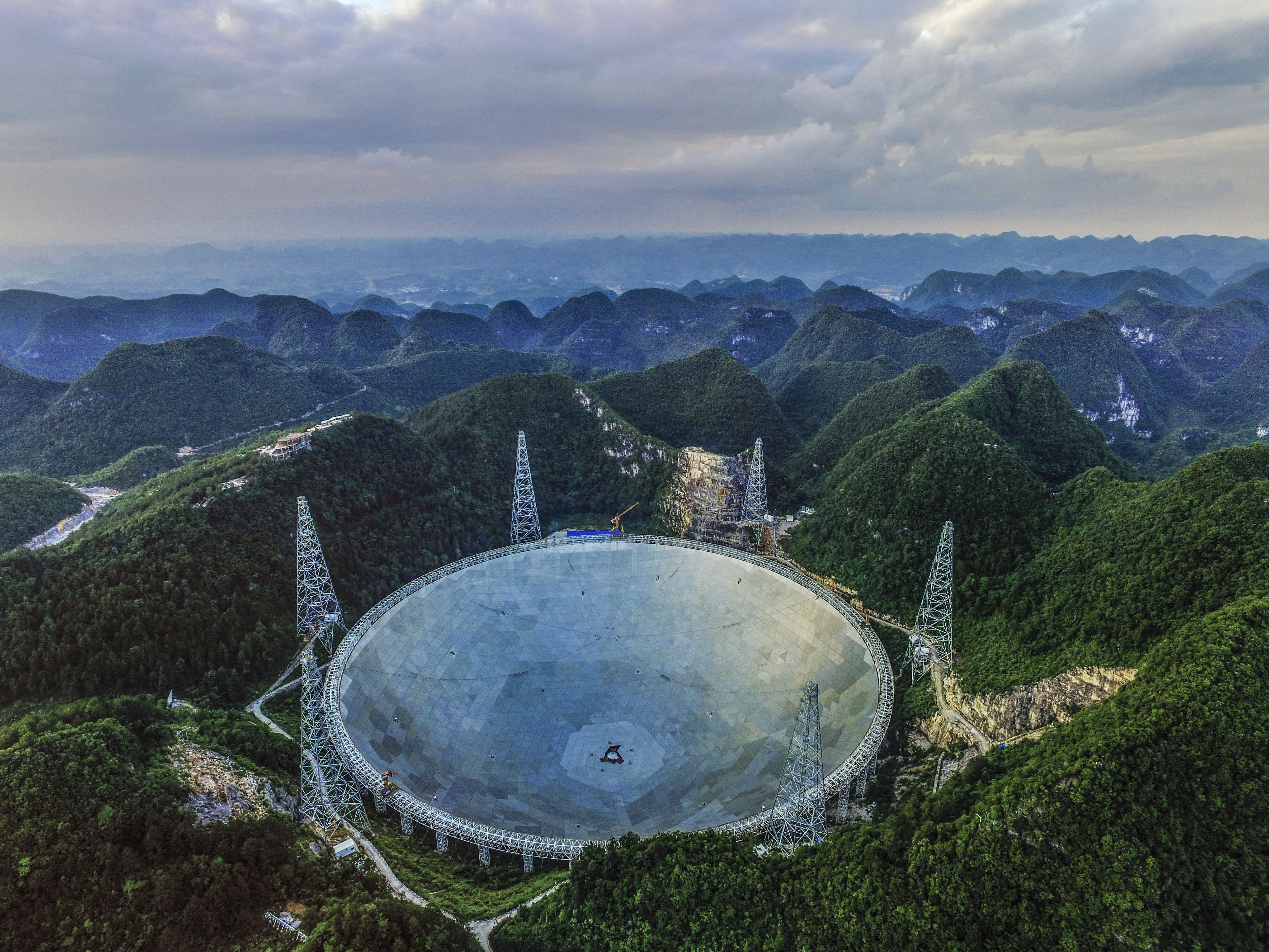 An aerial view of the 500-m Aperture Spherical Telescope (FAST) on June 10, 2016, in Qiannan Buyei and Miao Autonomous Prefecture in China (VCG via Getty Images)