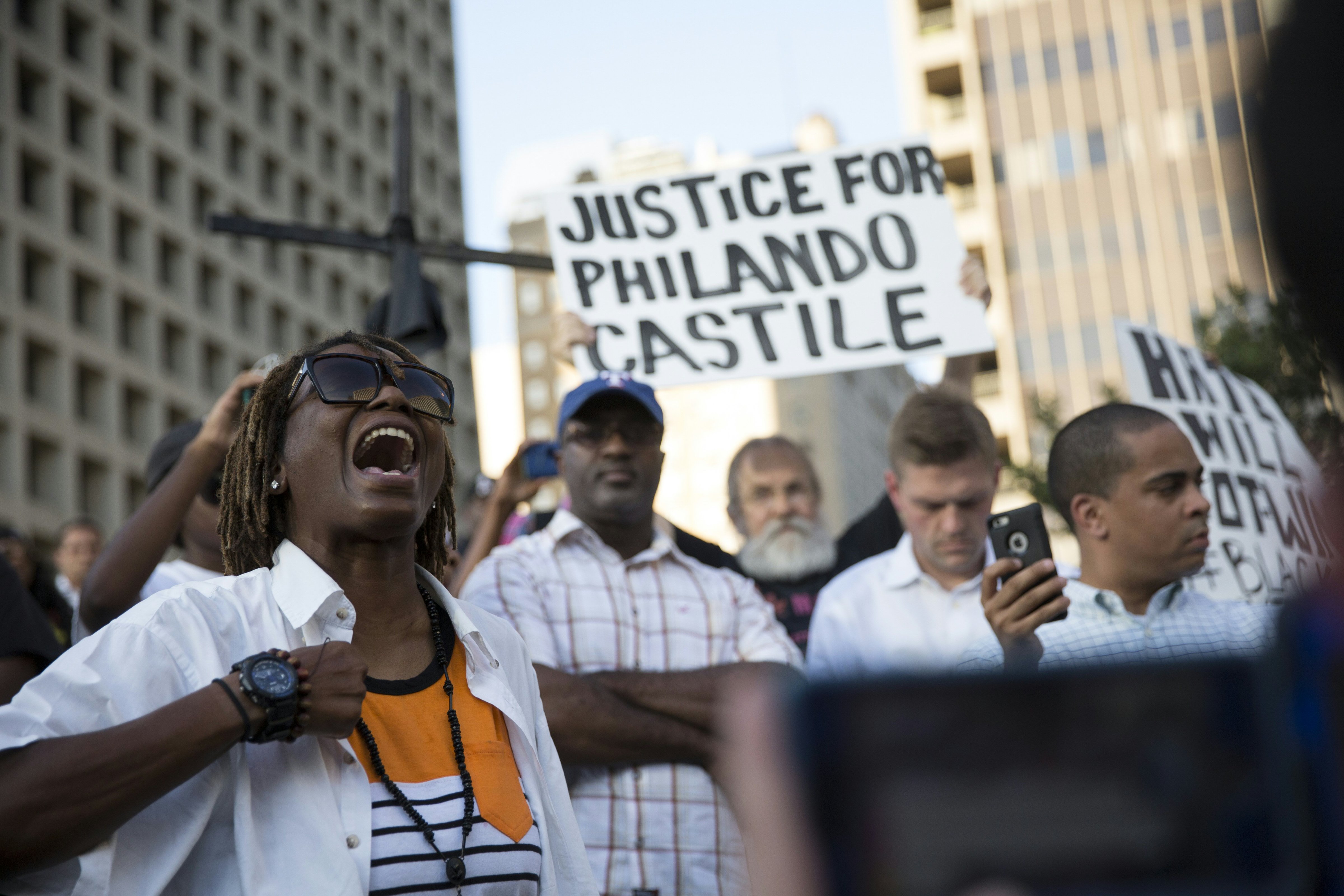 On July 7, 2016, people in Dallas protested the deaths of Alton Sterling and Philando Castile. Hours later, a sniper would target and kill police officers guarding the peaceful protest. (LAURA BUCKMAN&mdash;AFP/Getty Images)