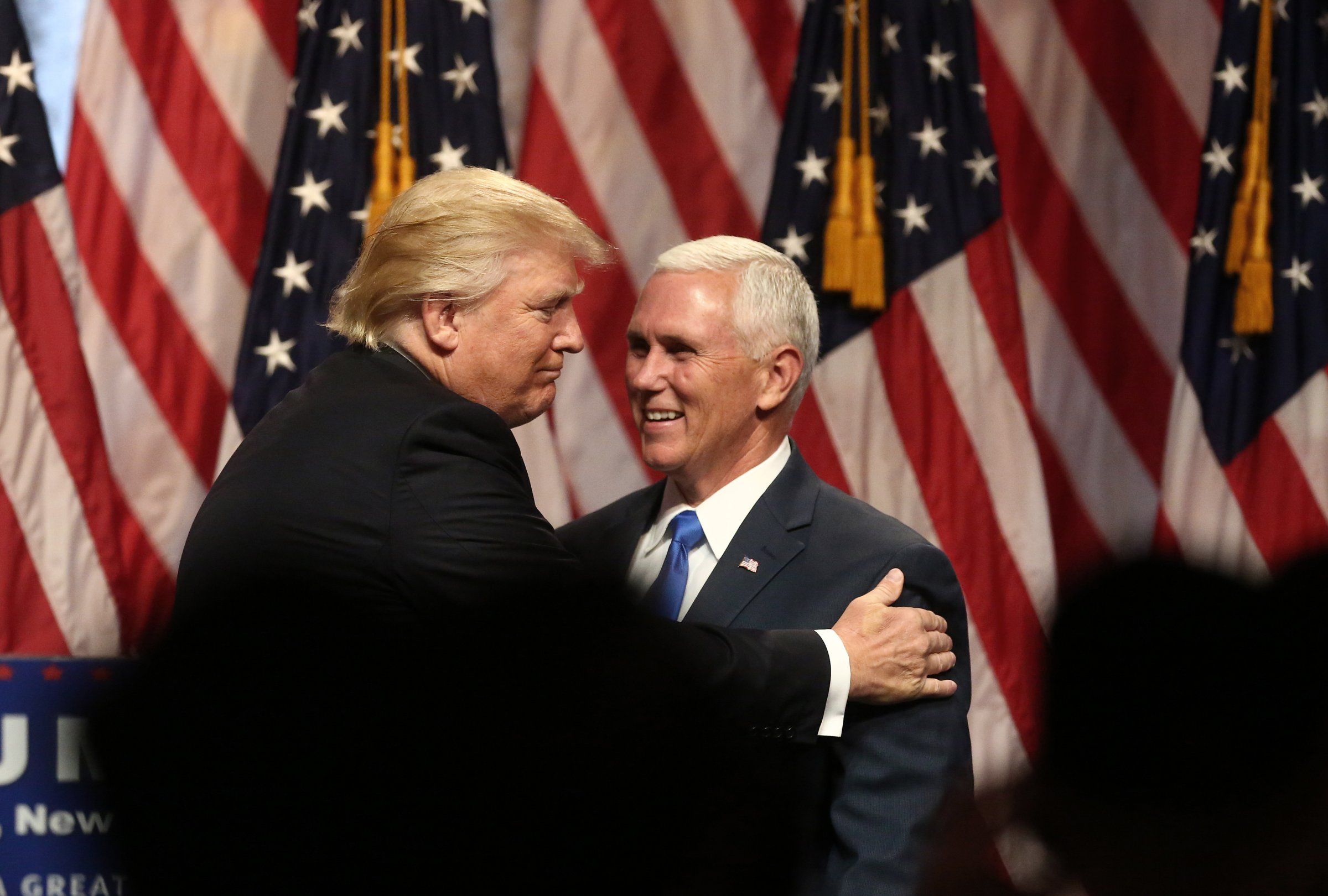 Donald Trump, presumptive Republican presidential nominee, greets Mike Pence, governor of Indiana and presumptive Republican vice presidential nominee, on stage during a campaign event in New York City, on July 16, 2016.