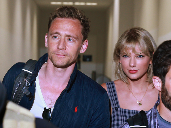Actor Tom Hiddleston and singer Taylor Swift arrive at Sydney International Airport in Sydney, New South Wales. (Cameron Richardson/Newspix/Getty Images)