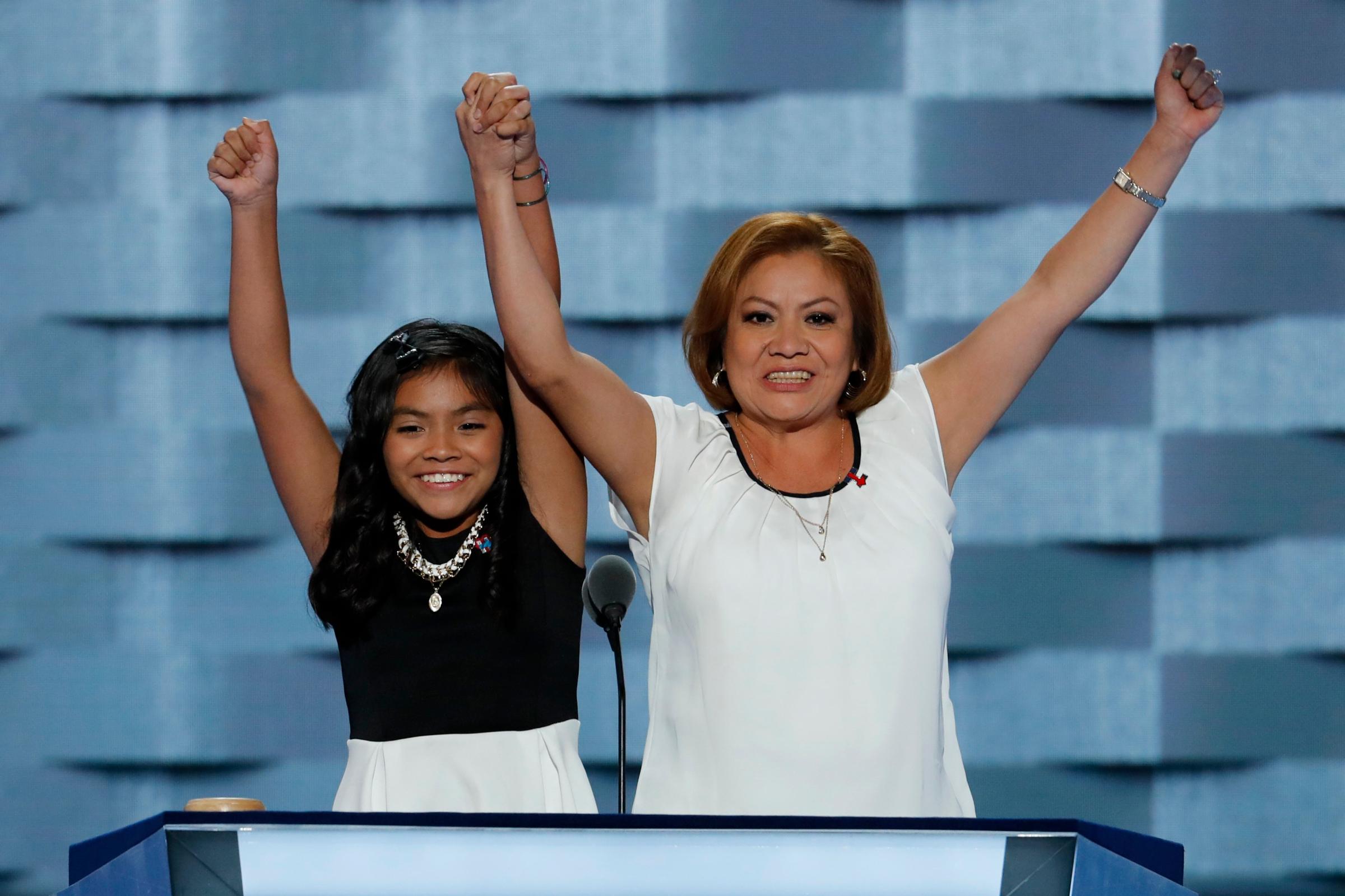 11-year-old Karla Ortiz, left, and her mother Francisca Ortiz speak during the first day of the Democratic National Convention in Philadelphia on Monday, July 25, 2016.