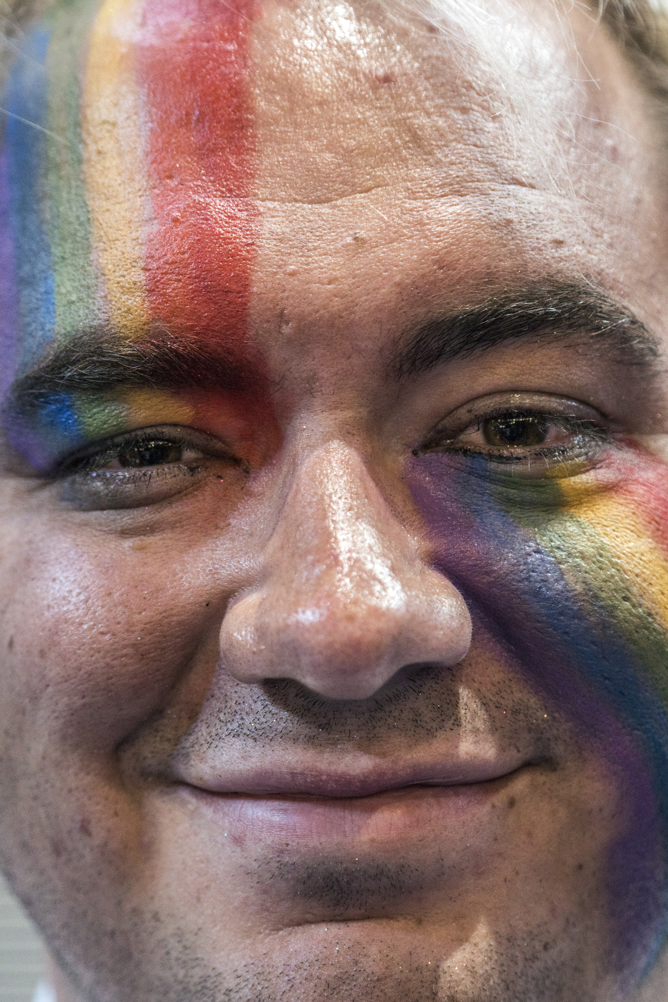 An attendee with pro LGBTQ face paint on the second day of the Democratic National Convention at the Wells Fargo Center, July 26, 2016 in Philadelphia, Pennsylvania.