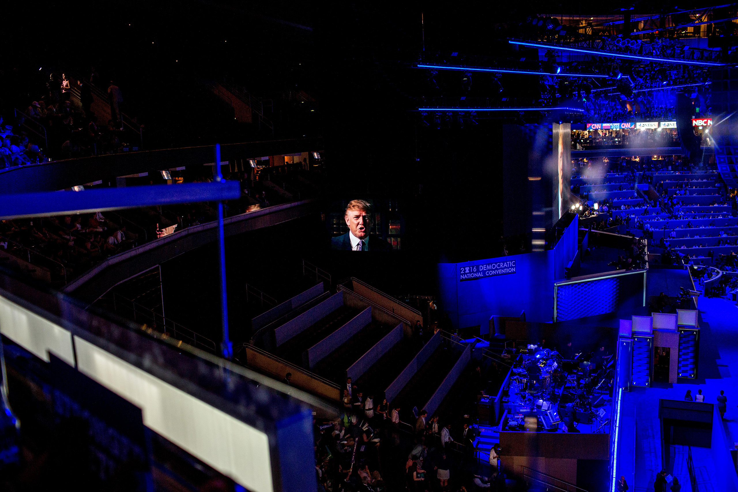 Donald Trump appears on a jumbo screen on first night of the Democratic National Convention at the Wells Fargo Center in Philadelphia, Pennsylvania, on Monday, July 25, 2016.