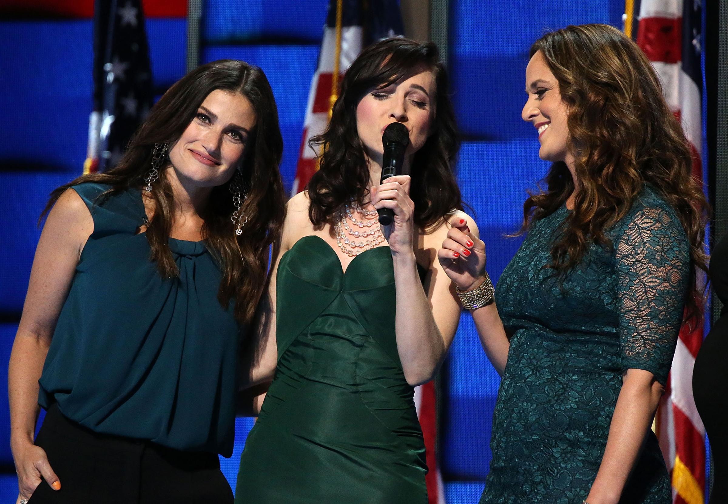 Singer Idina Menzel (L) joins the Stars of Broadway to perform 'What the World Needs Now' honoring those killed in the Pulse nightclub shooting in Orlando on the third day of the Democratic National Convention at the Wells Fargo Center in Philadelphia, Pennsylvania, on July 27, 2016.