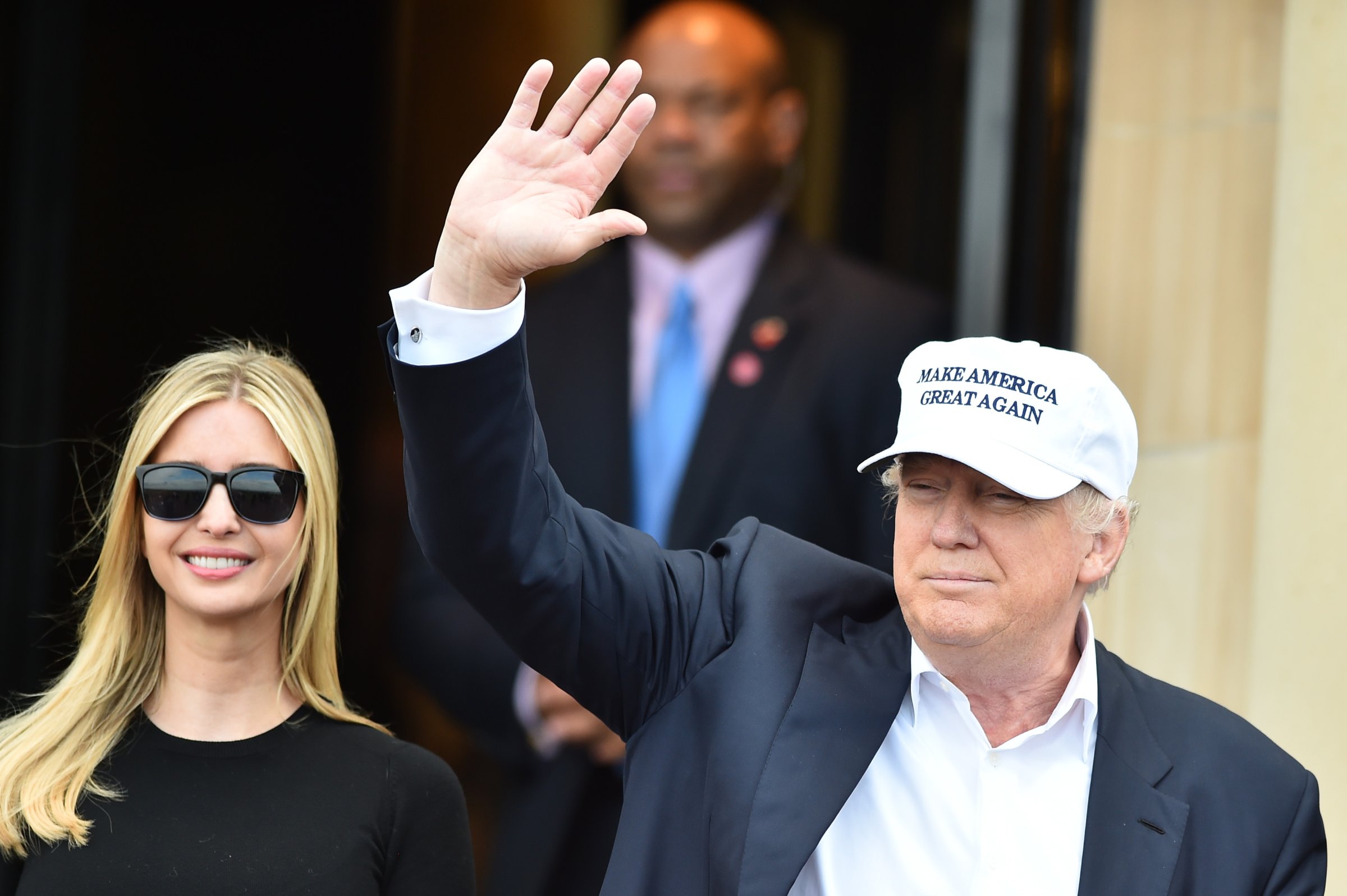 Presumptive Republican nominee for US president Donald Trumpwaves as he arrives to his Trump Turnberry Resort with his daughter Ivanka Trump on June 24, 2016 in Ayr, Scotland.