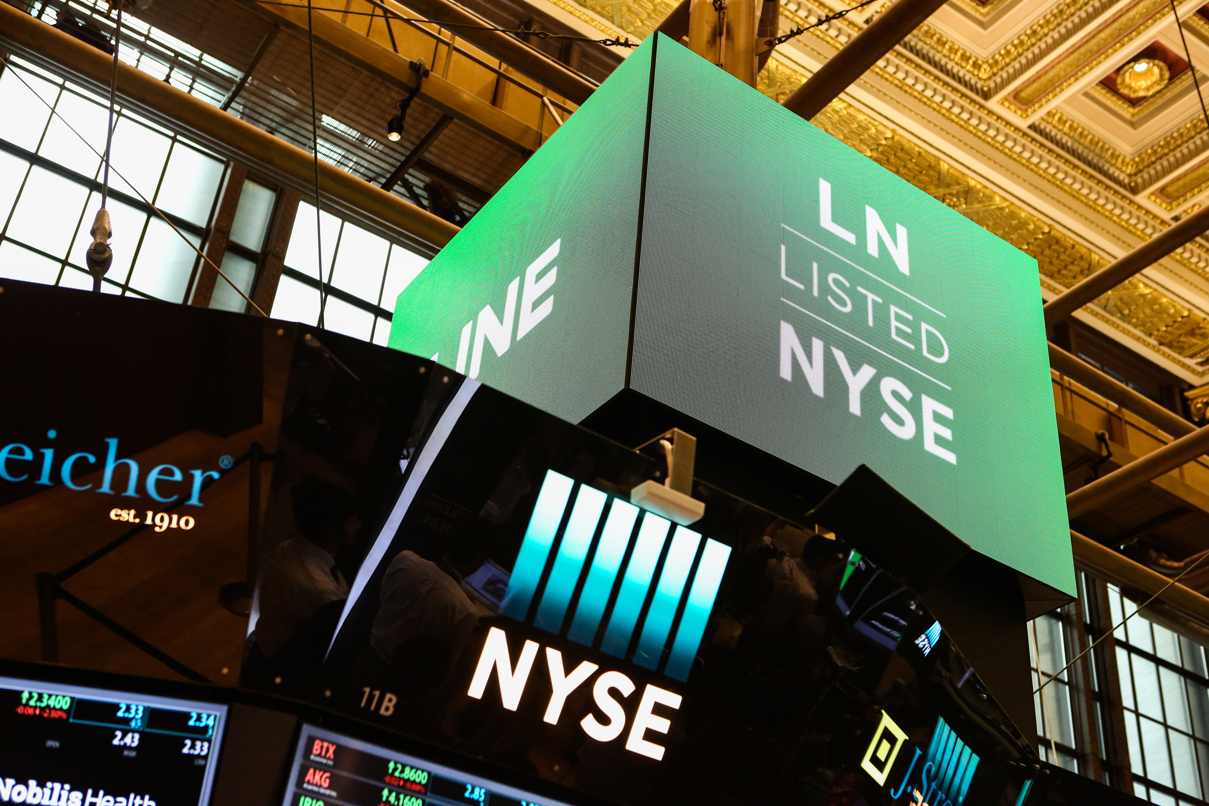 A monitor displays Line Corp. signage on the floor of the New York Stock Exchange (NYSE) in New York, U.S., on Thursday, July 14, 2016. (Chris Goodney&mdash;Bloomber/Getty Images)