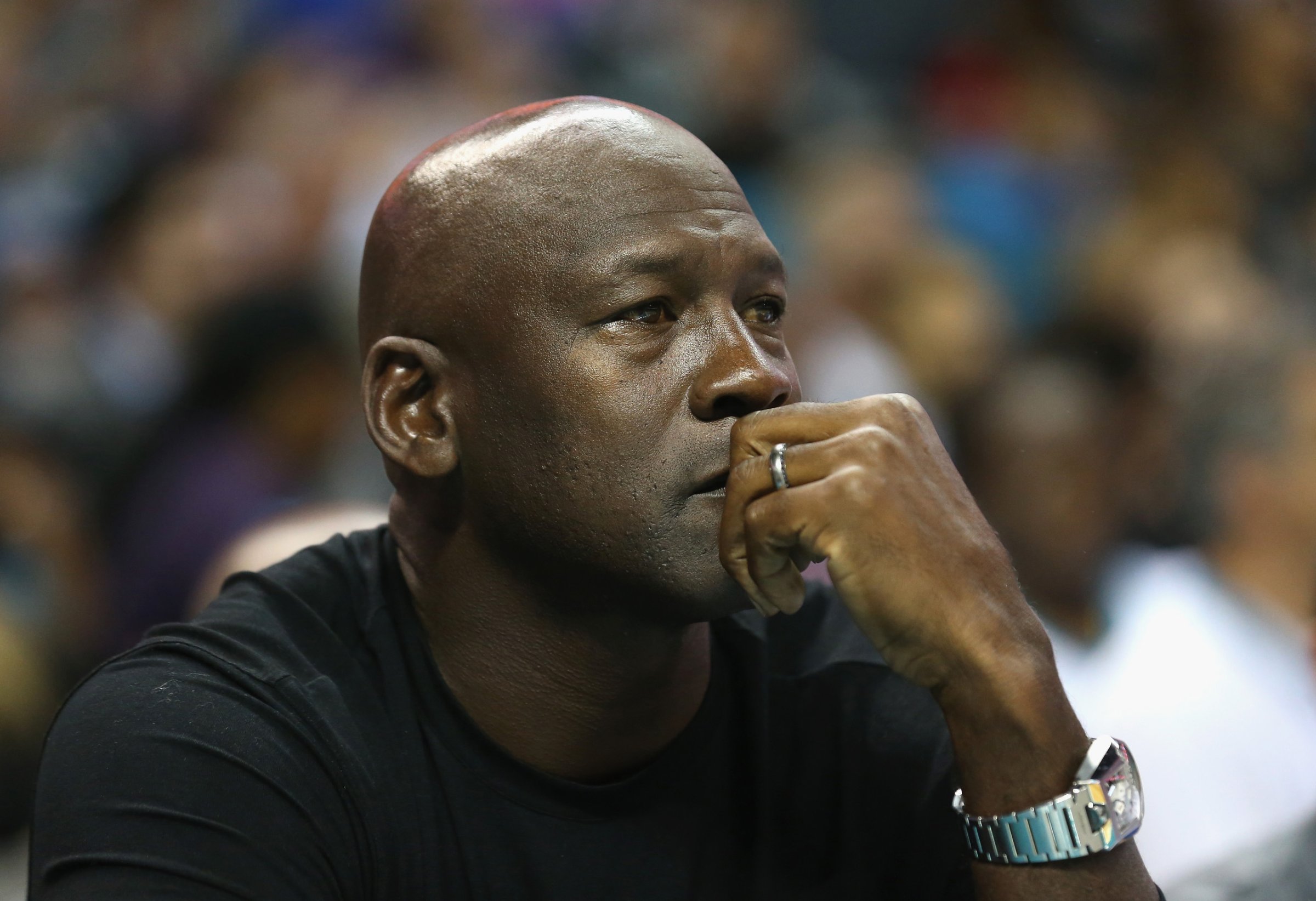 Owner of the Charlotte Hornets, Michael Jordan, watches on during their game against the Atlanta Hawks at Time Warner Cable Arena on in Charlotte on November 1, 2015.