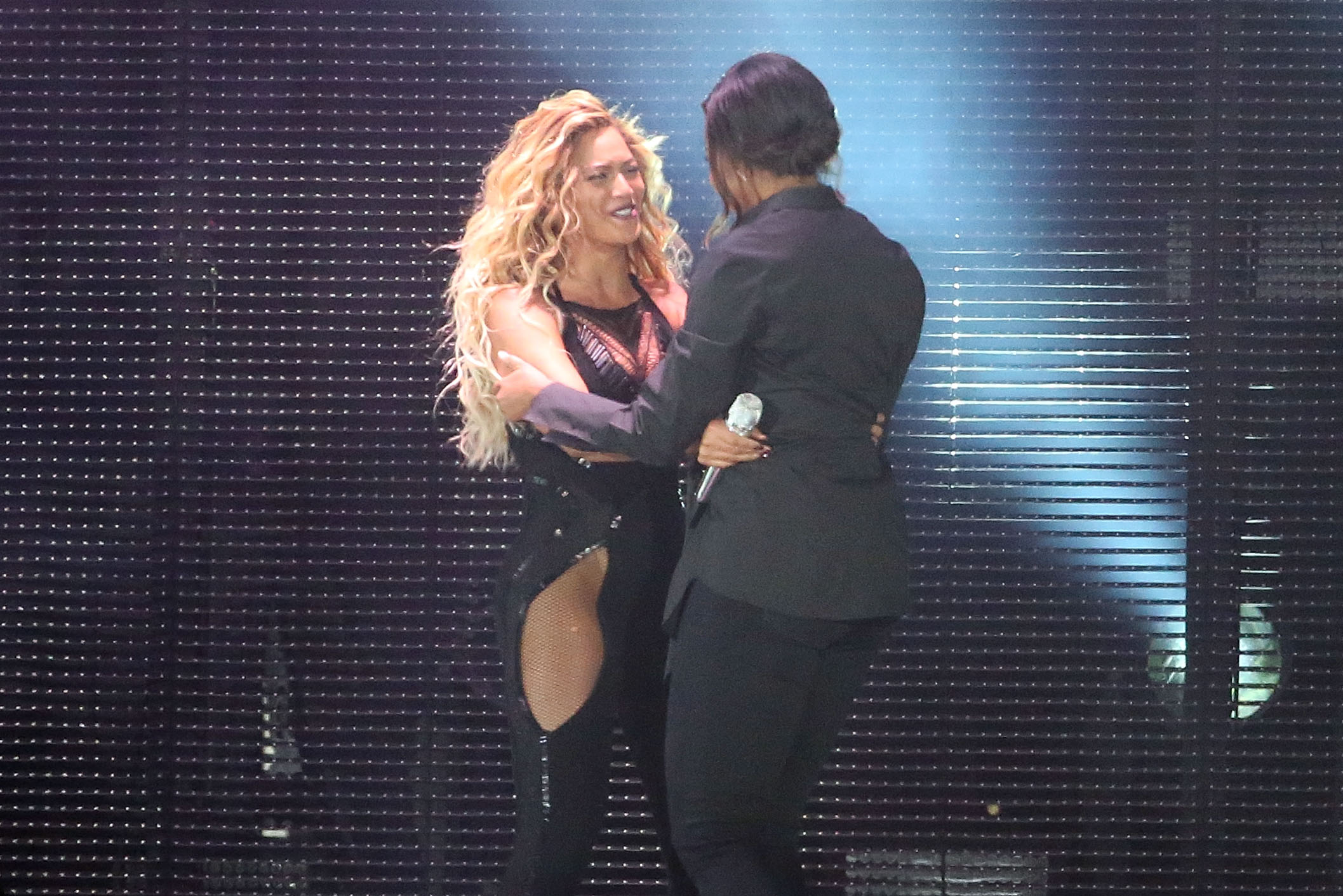 Beyonce and Michelle Obama hug during the 2015 Global Citizen Festival at Central Park on September 26, 2015 in New York City.