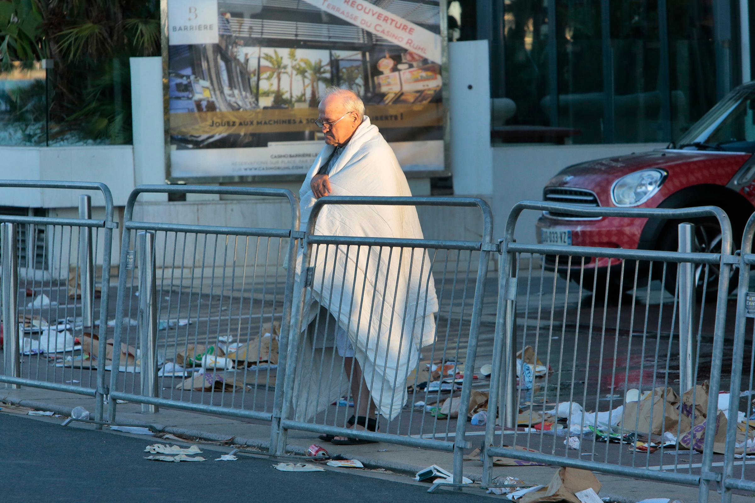 A man at the scene of the truck attack in Nice, France, on July 15, 2016. Authorities said a driver plowed into people celebrating Bastille Day late on Thursday, killing at least 84 people.