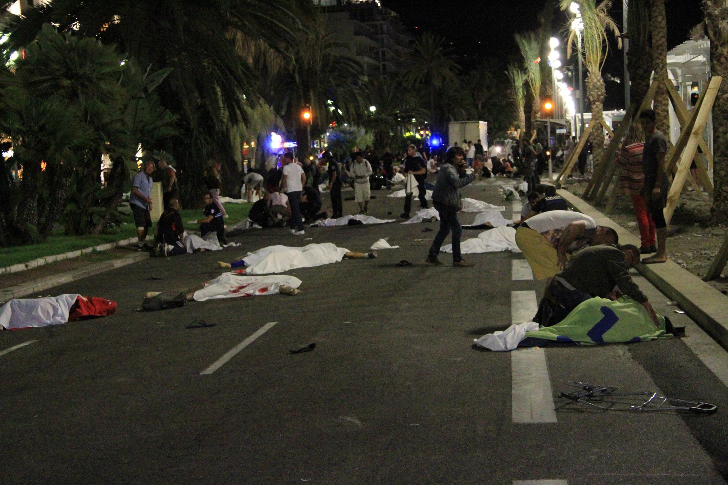 Bodies lie in the streets of Nice, France, after a terrorist attack that left at least 77 dead and dozens injured on July 14, 2016.