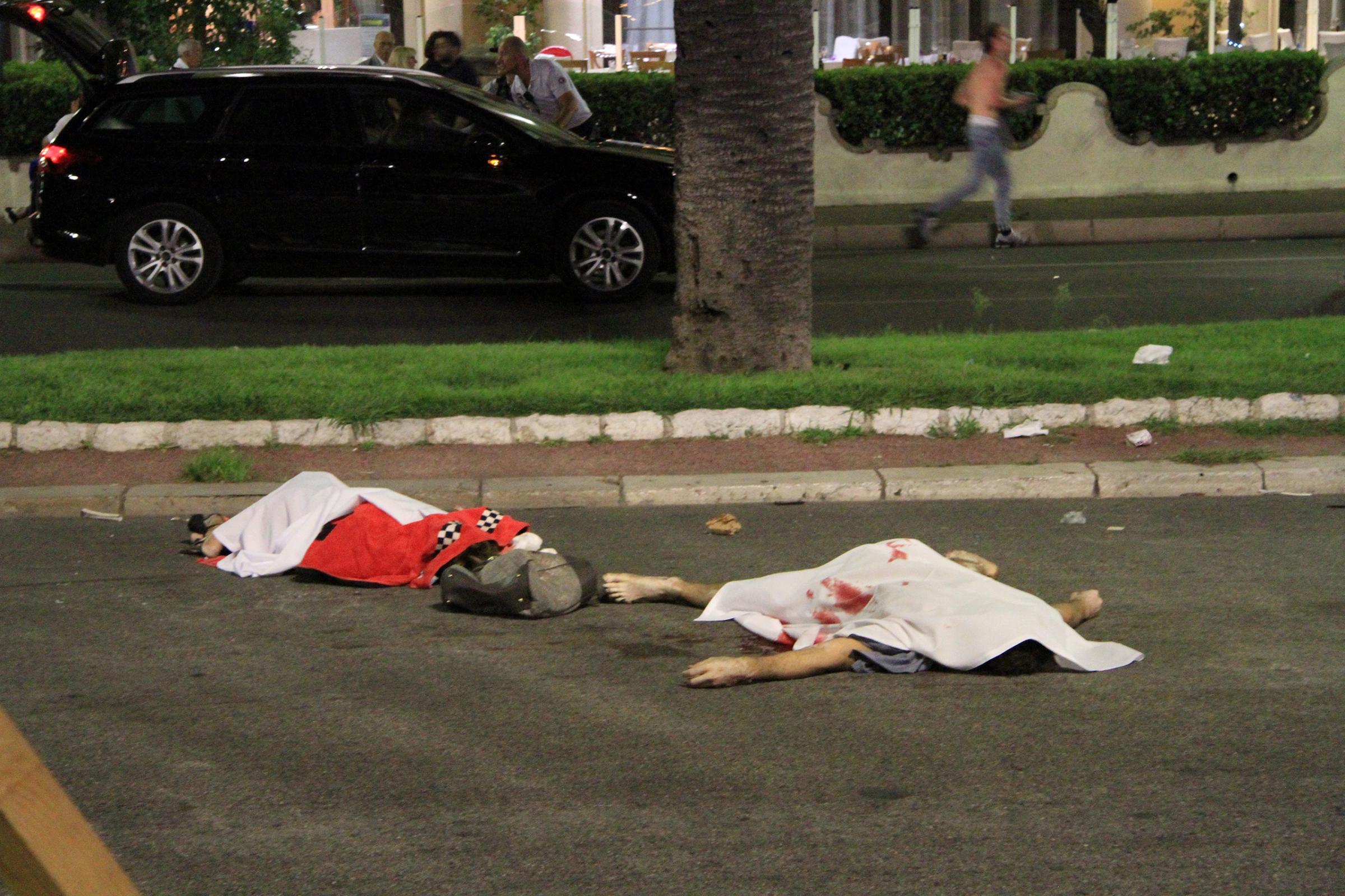 Bodies lie in the streets of Nice, France, after a terrorist attack left at least 77 dead and dozens injured on July 14, 2016.