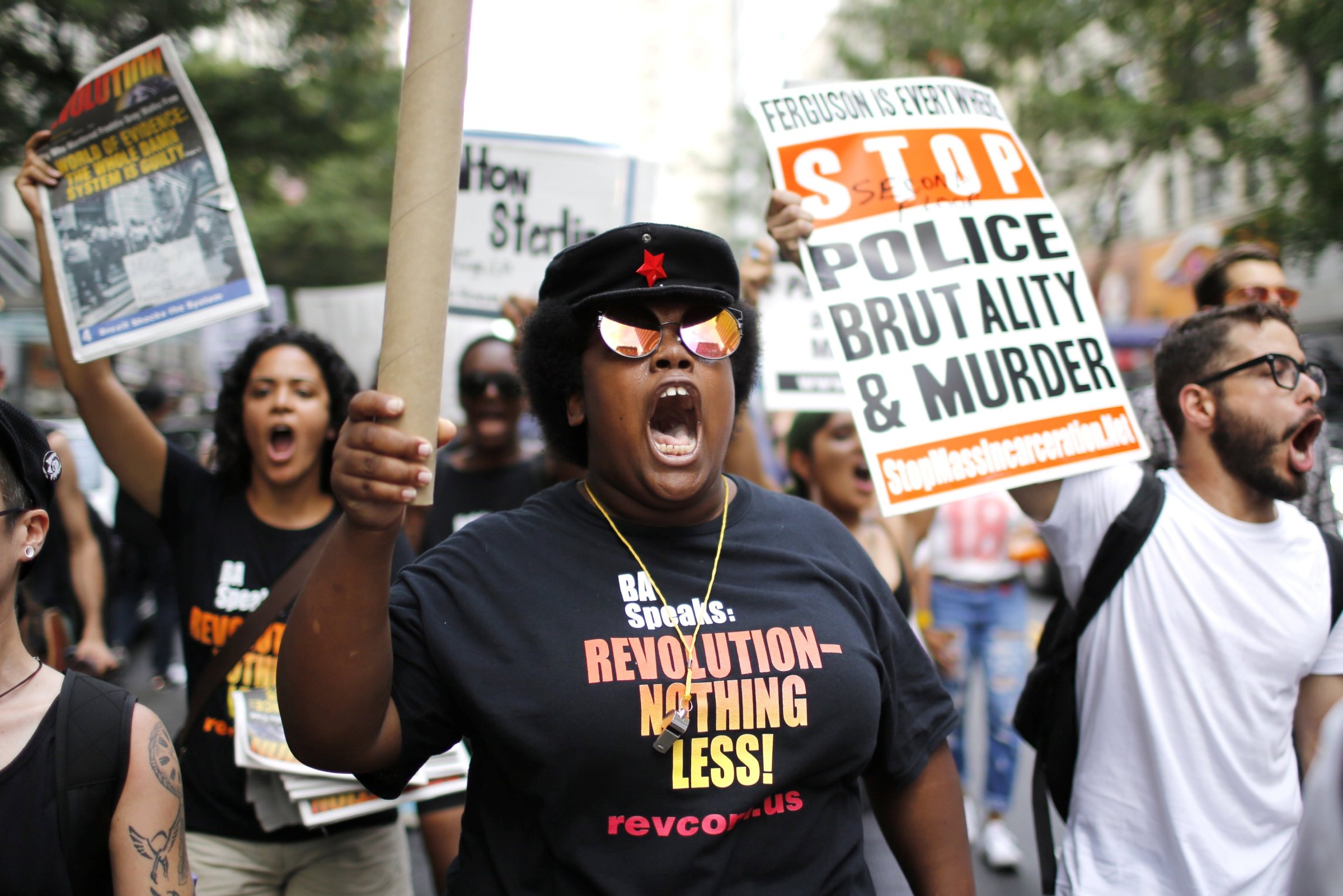 People take part in a protest for the killing of Alton Sterling and Philando Castile during a march along Manhattan's streets in New York