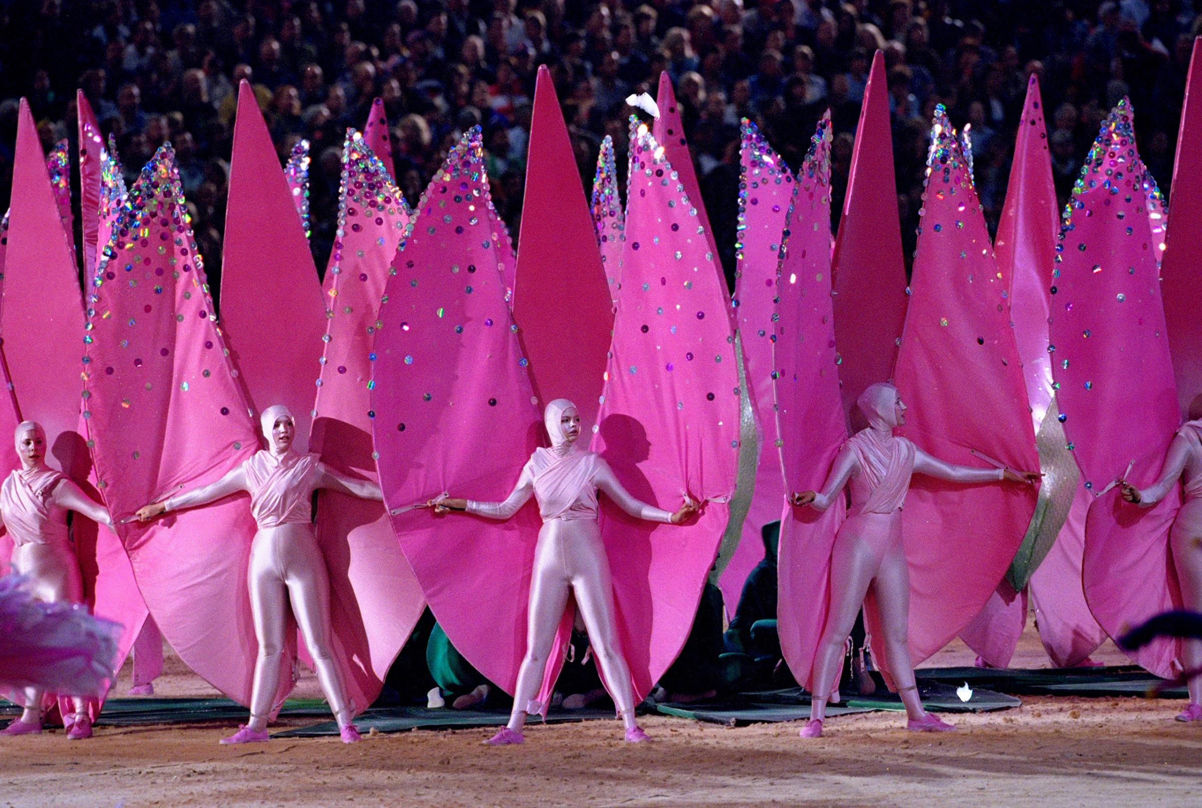 Sydney, 2000Performers dressed as pink petals step into formation to represent some of Australia's indigenous flowers.