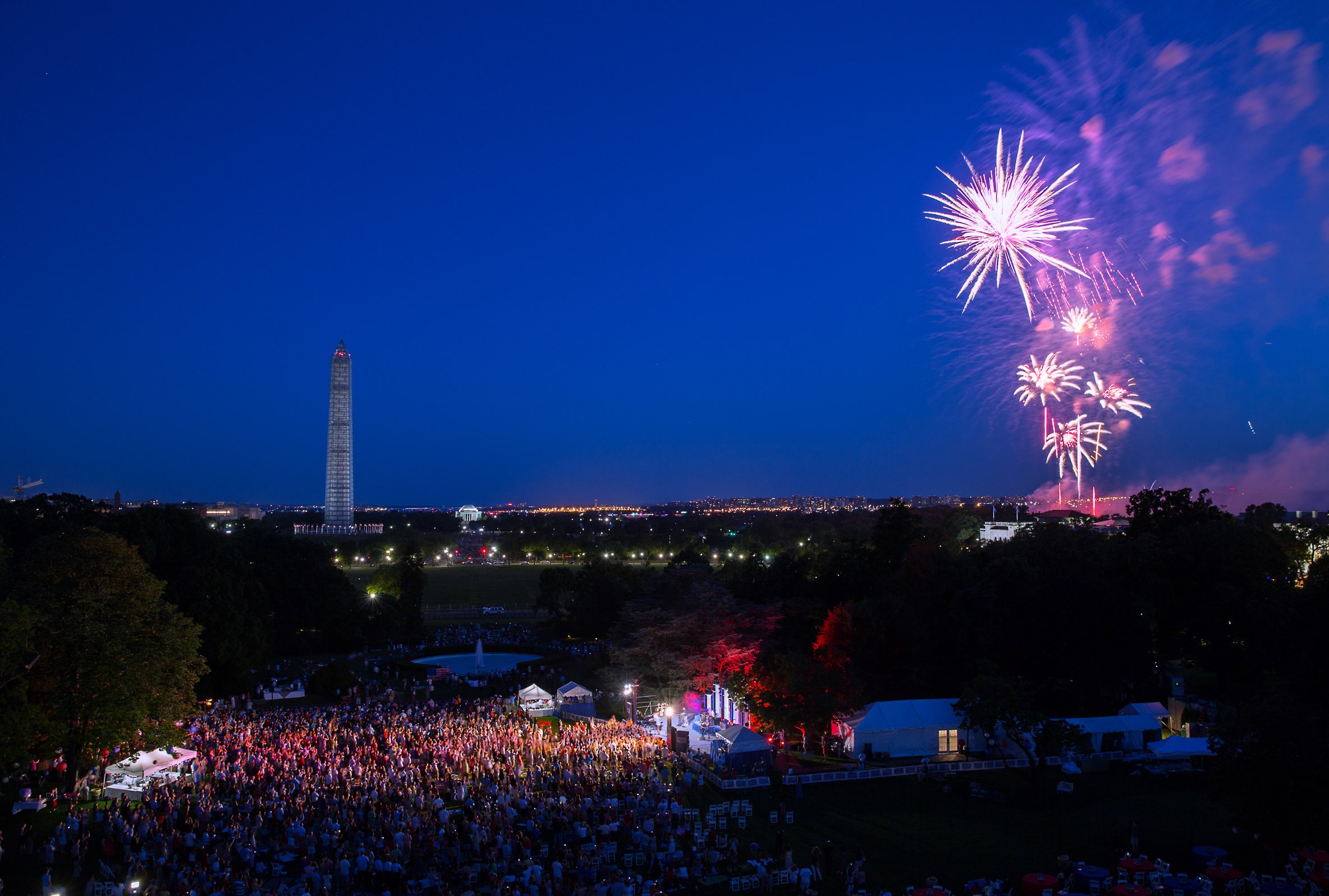 President Barack Obama and First Lady Michelle Obama watch fireworks from the roof of the White House during a Fourth of July celebration for military families and White House Staff on the South Lawn, July 4, 2013. (Official White House Photo by Pete Souza)