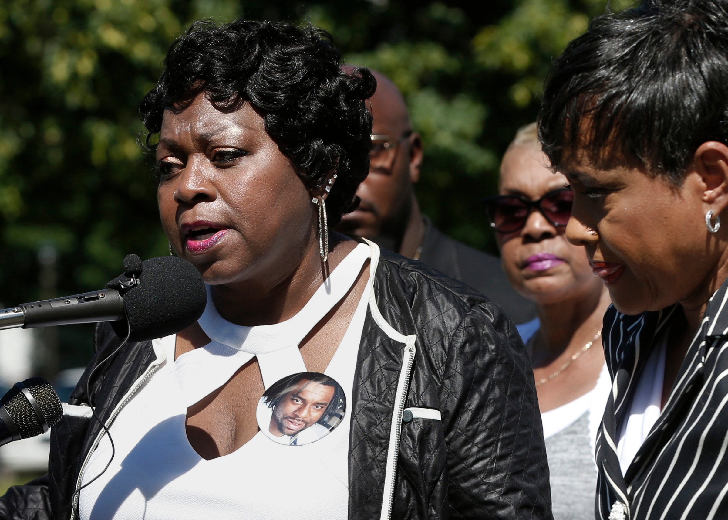TV Judge Glenda Hatchett, right, listens as Valerie Castile, the mother of Philando Castile, takes questions during a news conference on the State Capitol grounds, in St. Paul, Minn, July 12, 2016.