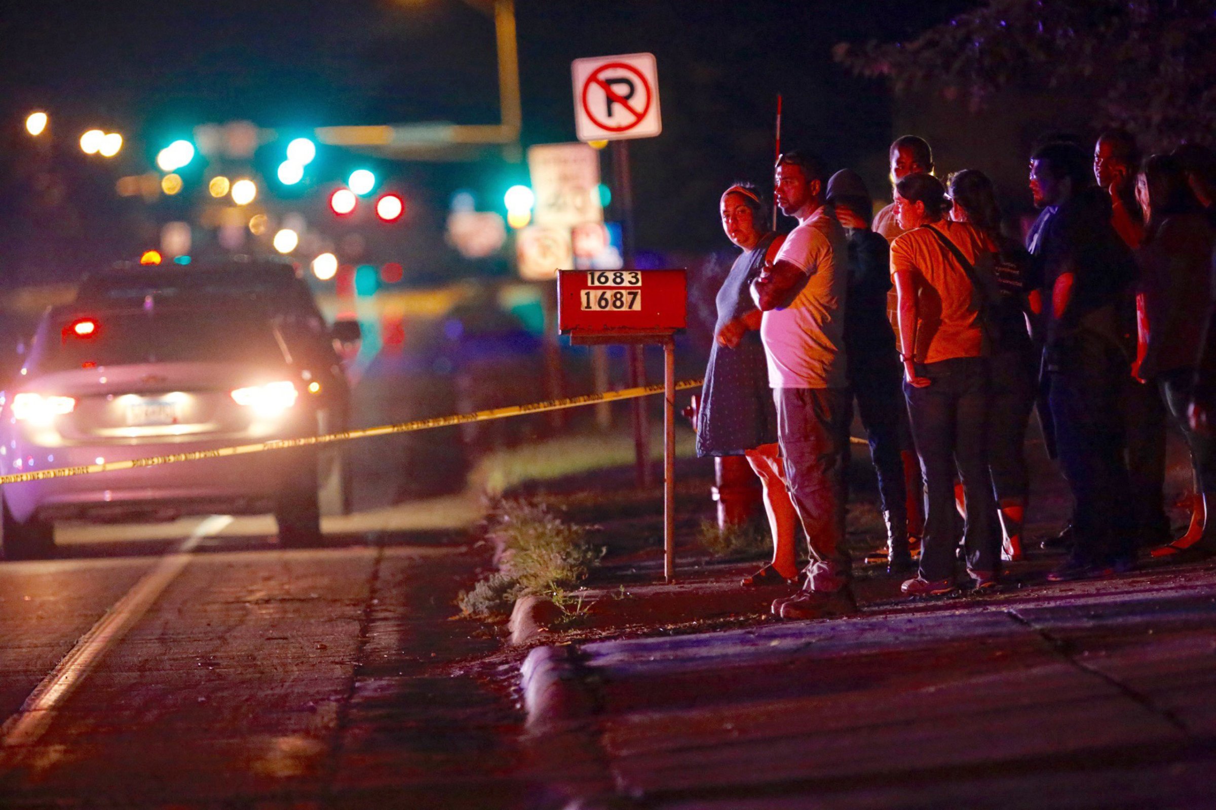 A crowd gathers at the scene of the shooting of Philando Castile by a St. Anthony Police officer in Falcon Heights, Minn. on July 6, 2016.