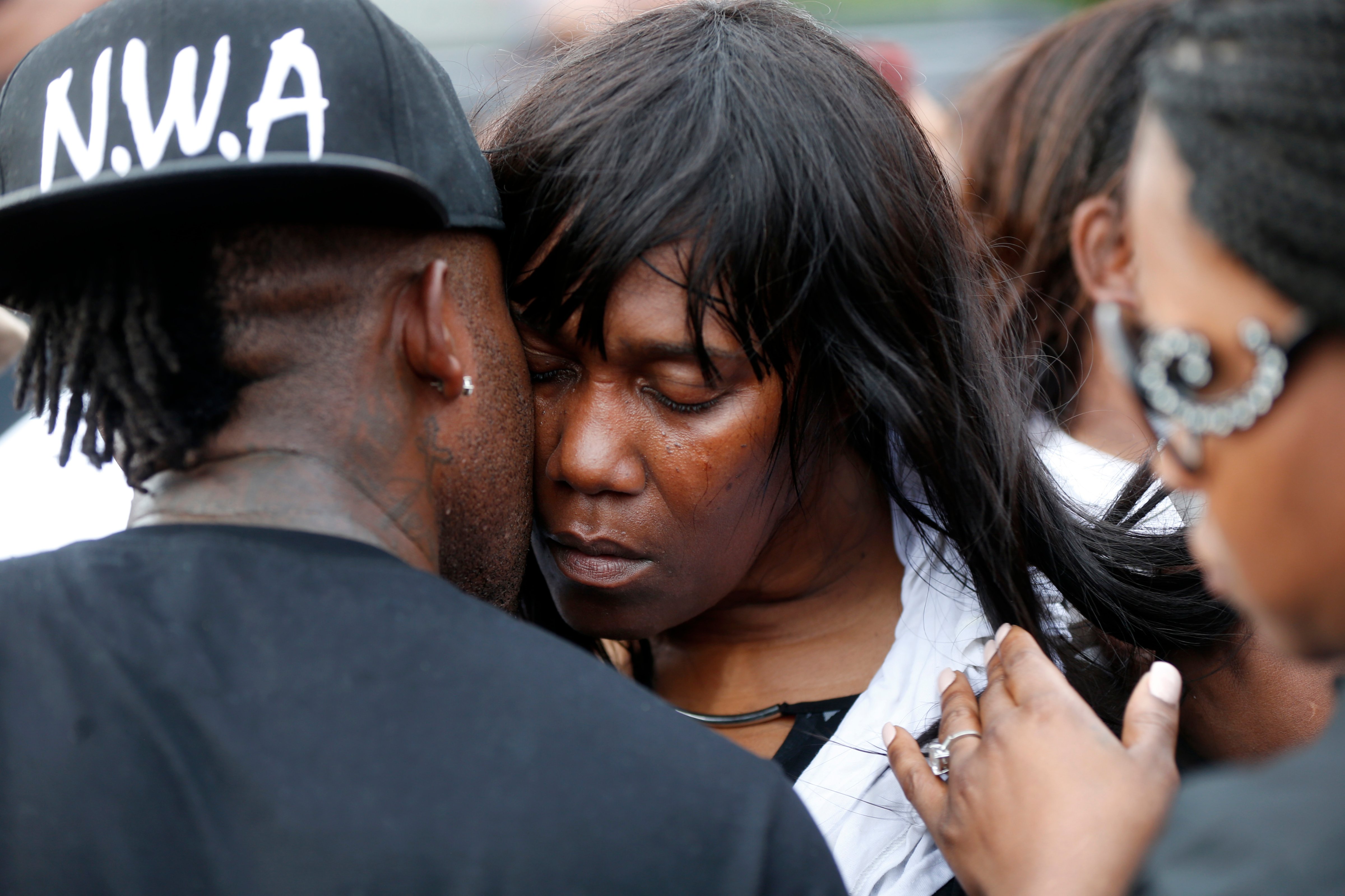 Sandra Sterling, aunt of Alton Sterling, is comforted at a vigil outside the Triple S convenience store in Baton Rouge, La., Wednesday, July 6, 2016 (Gerald Herbert—AP)