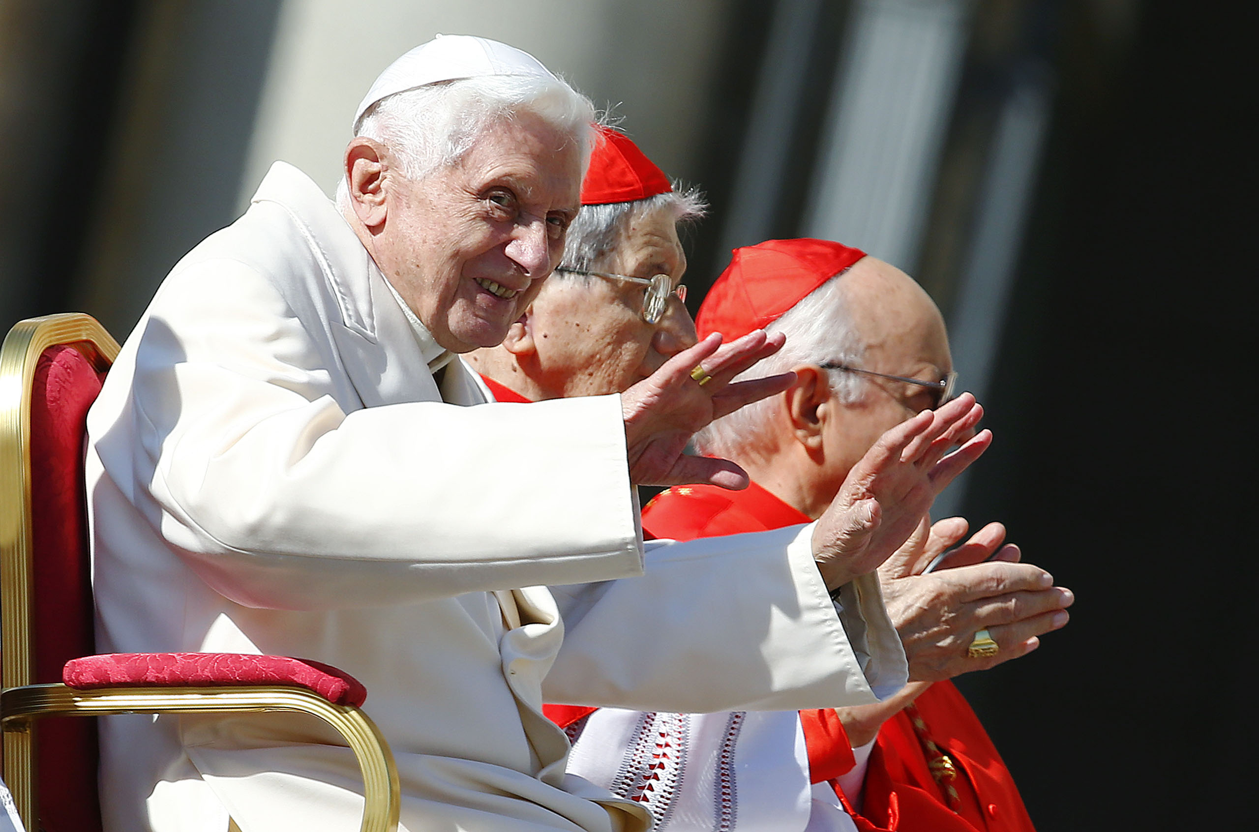 Emeritus Pope Benedict XVI waves before a mass in Saint Peter's square at the Vatican, Sept. 28, 2014. (Tony Gentile—Reuters)