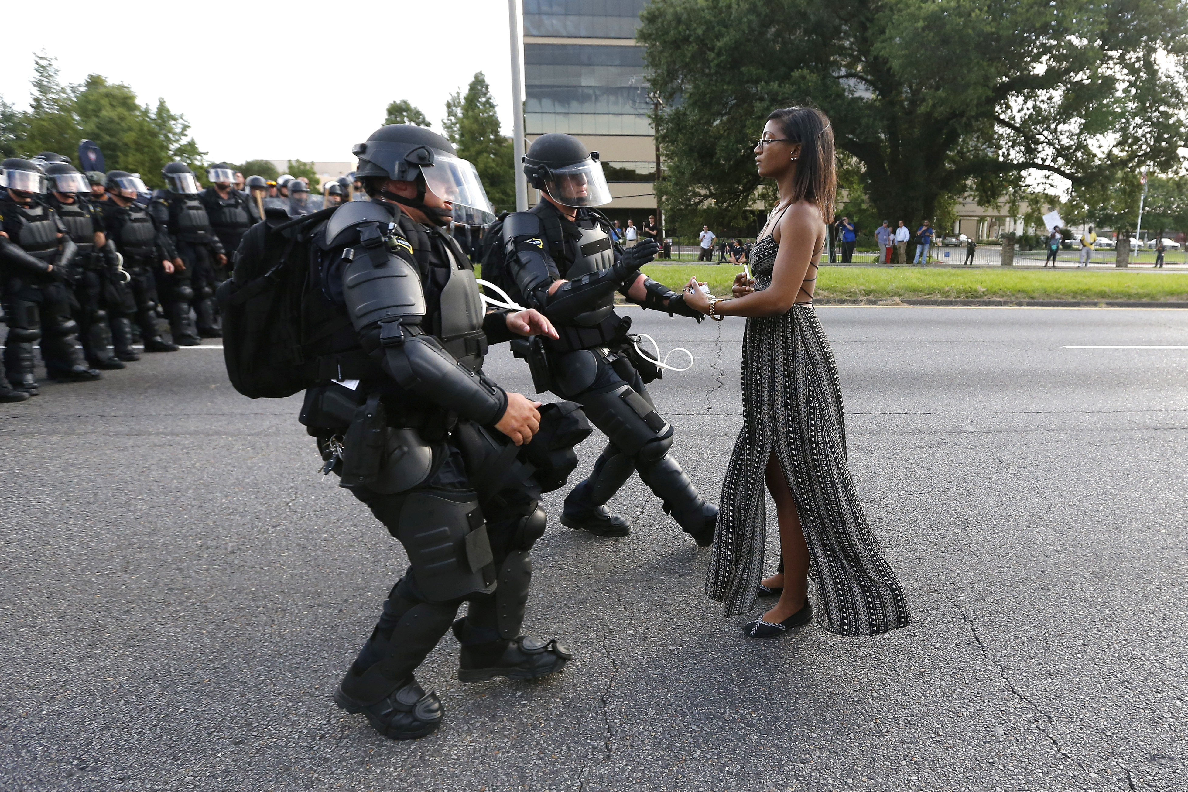 A demonstrator protesting the shooting death of Alton Sterling is detained by law enforcement near the headquarters of the Baton Rouge Police Department in Baton Rouge, La., on July 9, 2016 (Jonathan Bachman—Reuters)