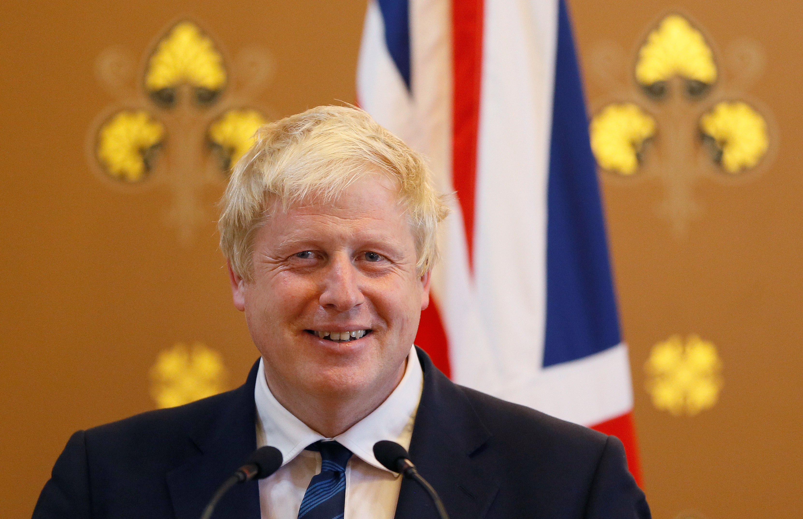 Britain's Foreign Secretary Boris Johnson smiles during a press conference with U.S. Secretary of State John Kerry at the Foreign Office in London, July 19, 2016 (Reuters)